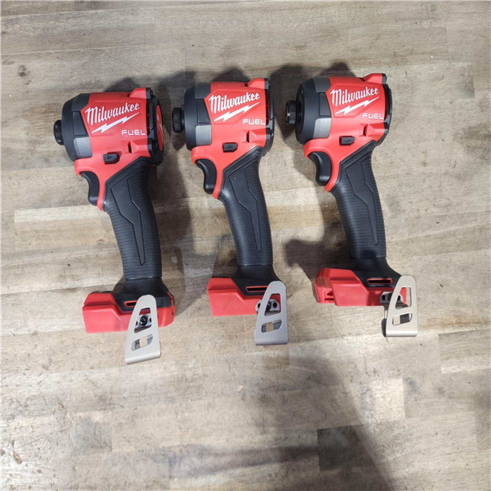 HOUSTON LOCATION - AS-IS (APPEARS LIKE NEW) (3) Milwaukee 2953-20 18V Lithium-Ion Brushless Cordless 1/4 Hex Impact Driver W/ (2) BATTERY & CHARGER