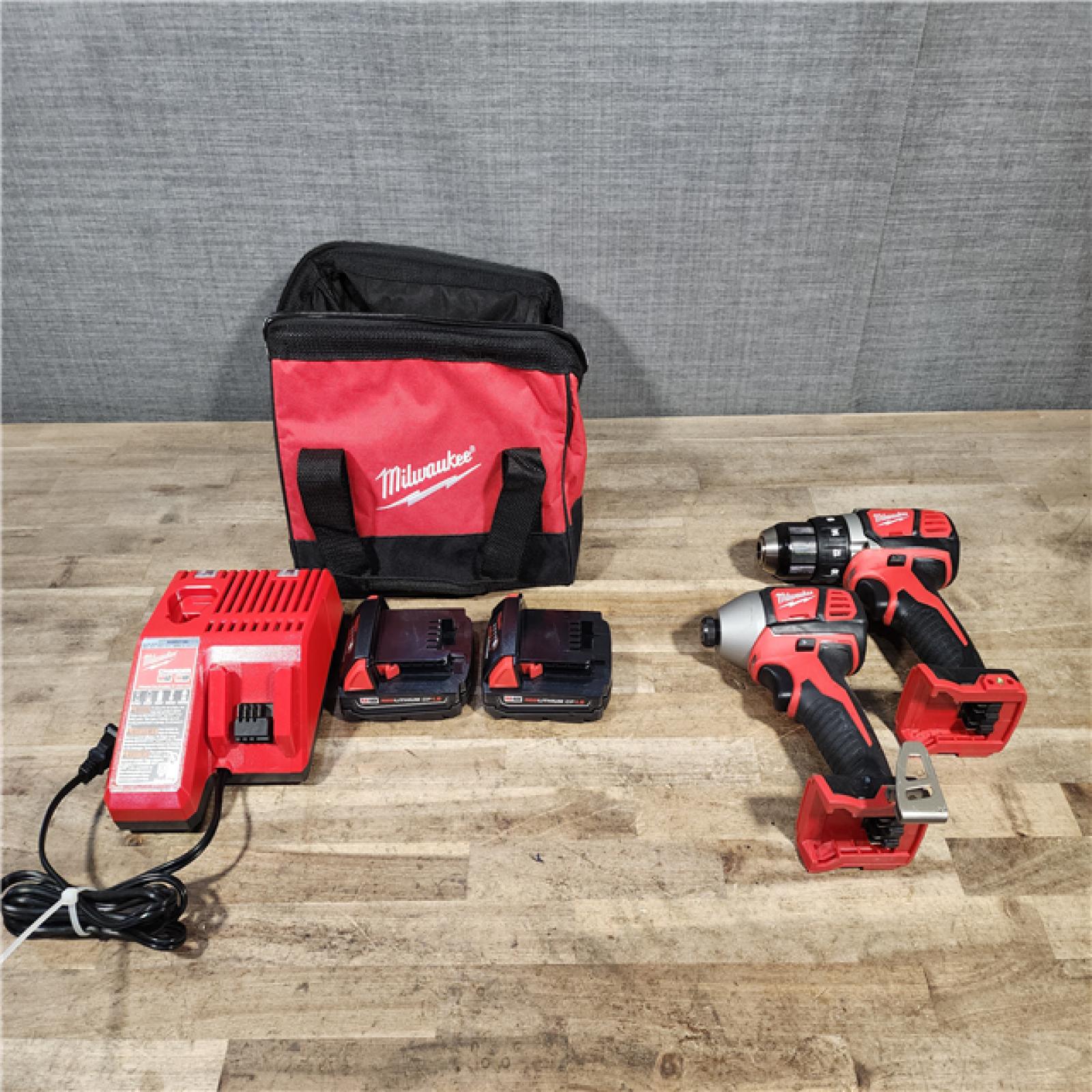 HOUSTON LOCATION - AS-IS Milwaukee M18 Brushed Cordless (2-Tool) Drill/Driver and Impact Driver Kit