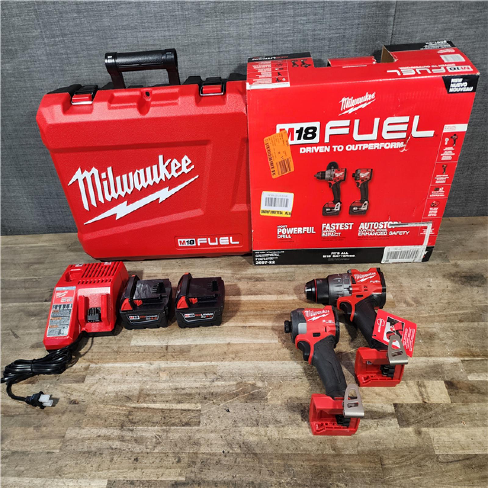 HOUSTON LOCATION - AS-IS Milwaukee FUEL 18V Lithium-Ion Brushless Cordless Hammer Drill and Impact Driver Combo Kit