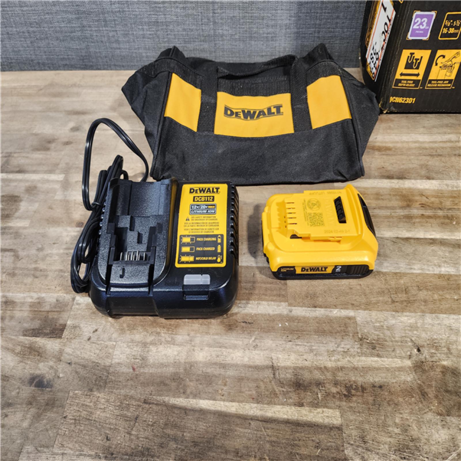HOUSTON LOCATION - AS-IS DEWALT ATOMIC 20V MAX Lithium Ion Cordless 23 Gauge Pin Nailer Kit with 2.0Ah Battery and Charger