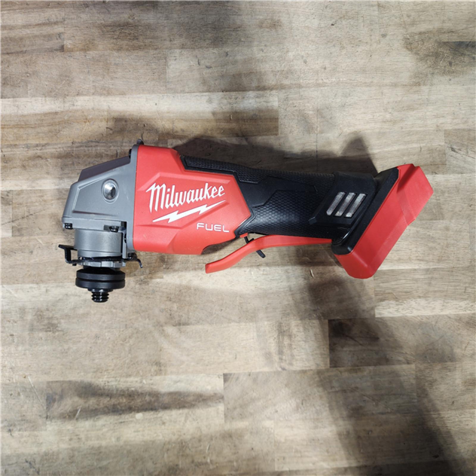 HOUSTON LOCATION - AS-IS Milwaukee 2880-20 FUEL 18-Volt Lithium-Ion Brushless Cordless 4-1/2 in./5 in. Grinder W/Paddle Switch (Tool-Only)