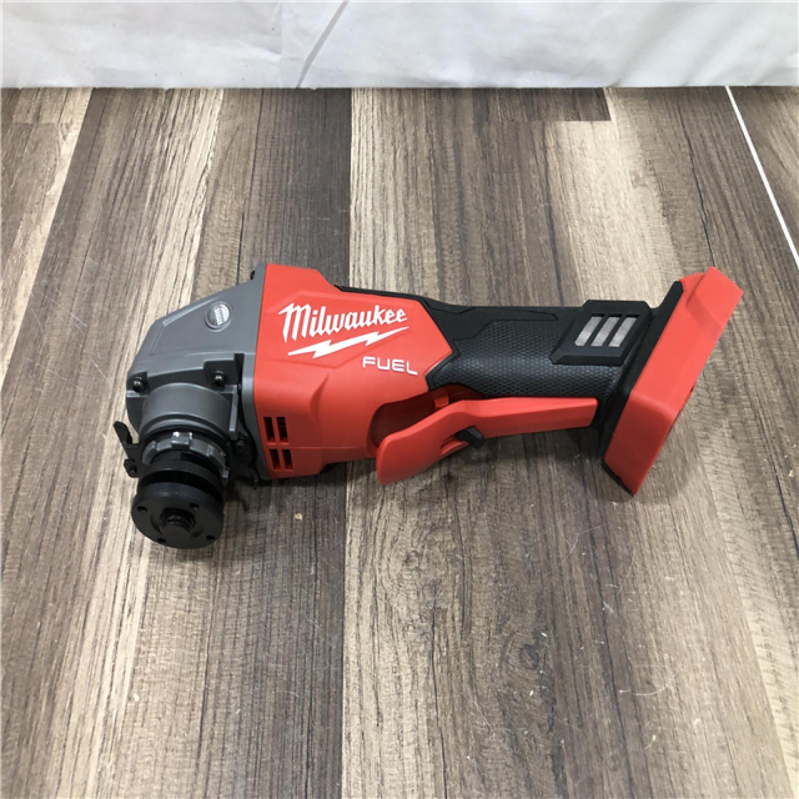 AS-IS Milwaukee FUEL 18V Lithium-Ion Brushless Cordless 4-1/2 in./5 in. Grinder w/Paddle Switch (Tool-Only)