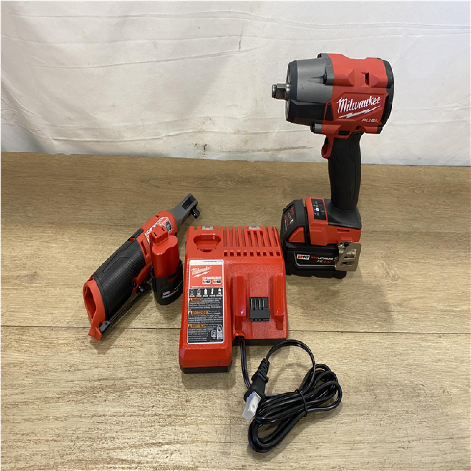 AS-IS - Milwaukee FUEL 18V Cordless Mid Torque 1/2 in. Impact Wrench w/ 12 FUEL 3/8 in. Ratchet Combo Kit