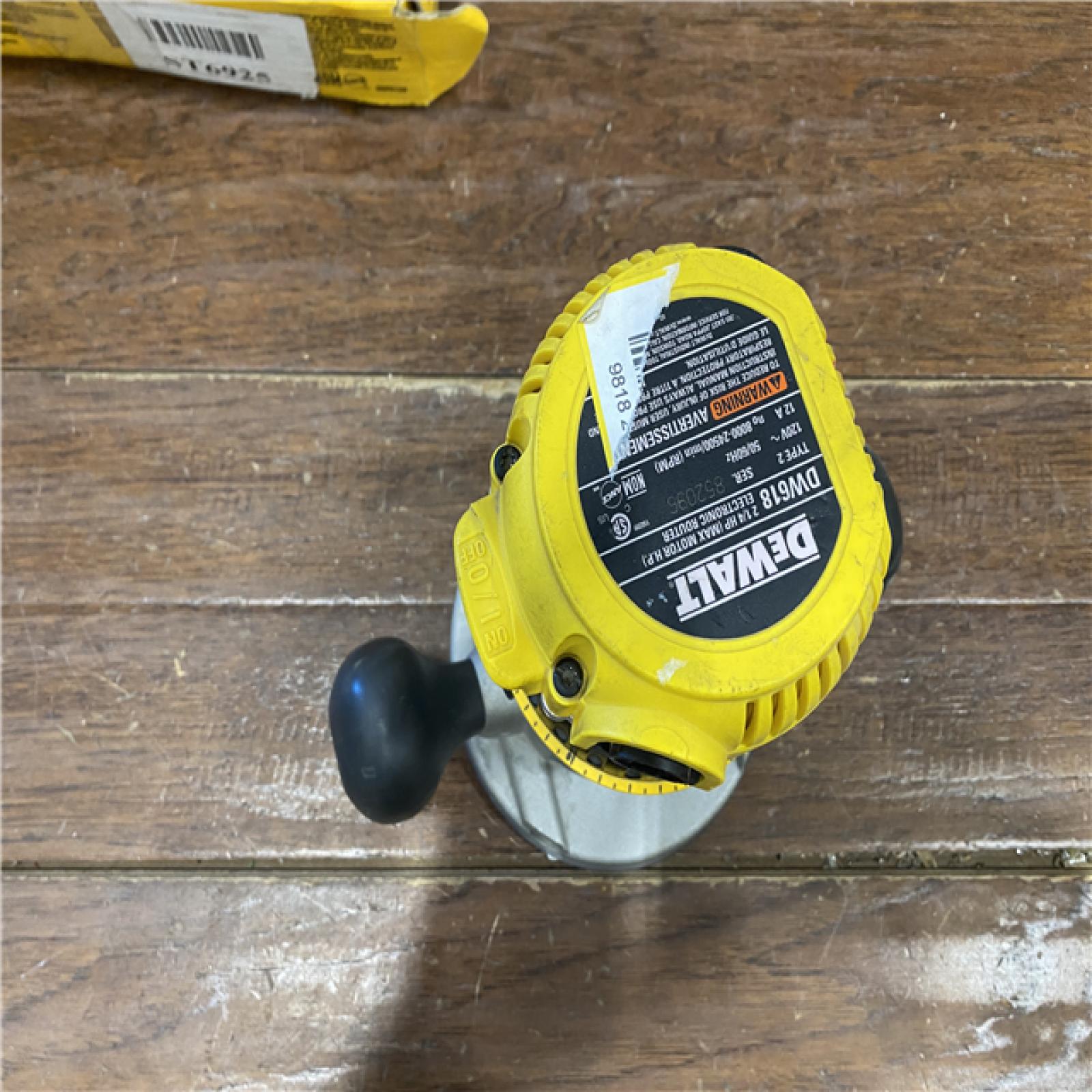 AS-IS DEWALT 12 Amp Corded 2-1/4 Horsepower Electronic Variable Speed Fixed Base Router with Soft Start