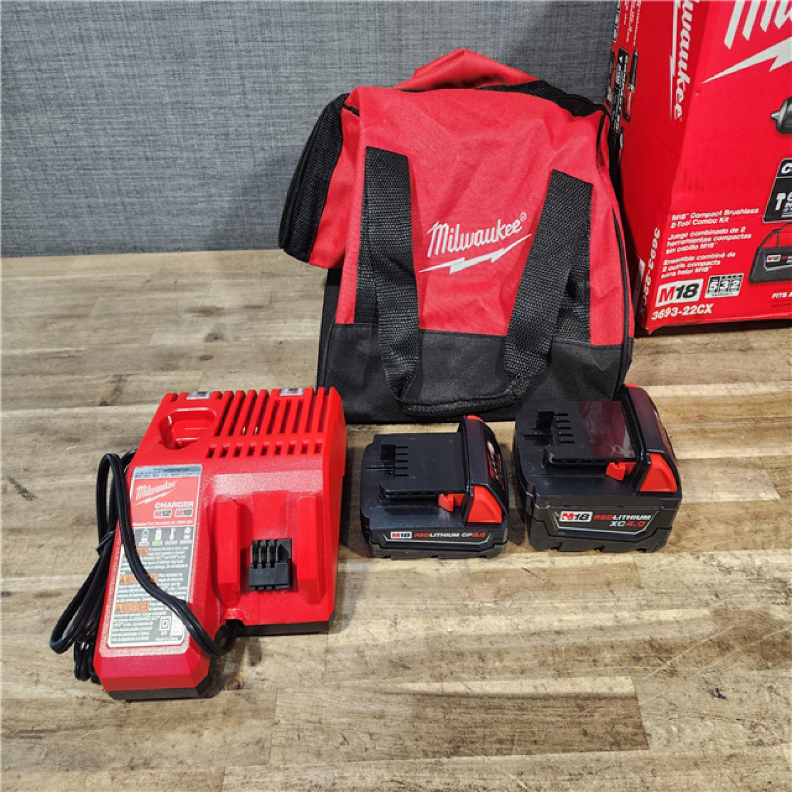 HOUSTON LOCATION - AS-IS M18 18-Volt Lithium-Ion Brushless Cordless Compact Hammer Drill/Impact Combo Kit (2-Tool) with (2) Batteries, Bag