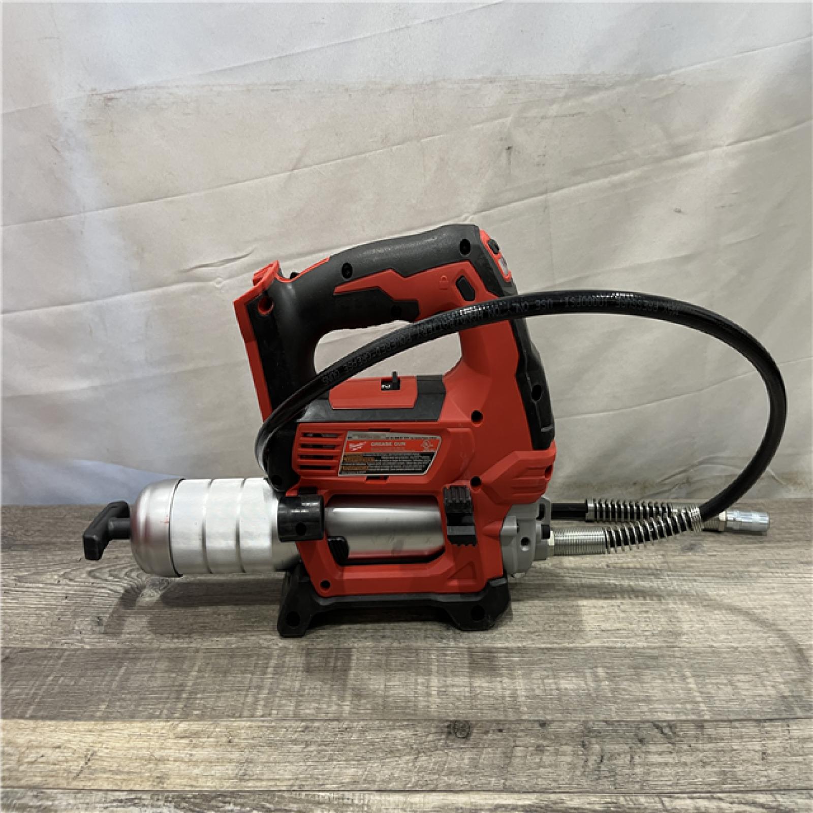 AS-IS Milwaukee 18V Lithium-Ion Cordless Grease Gun 2-Speed (Tool-Only)