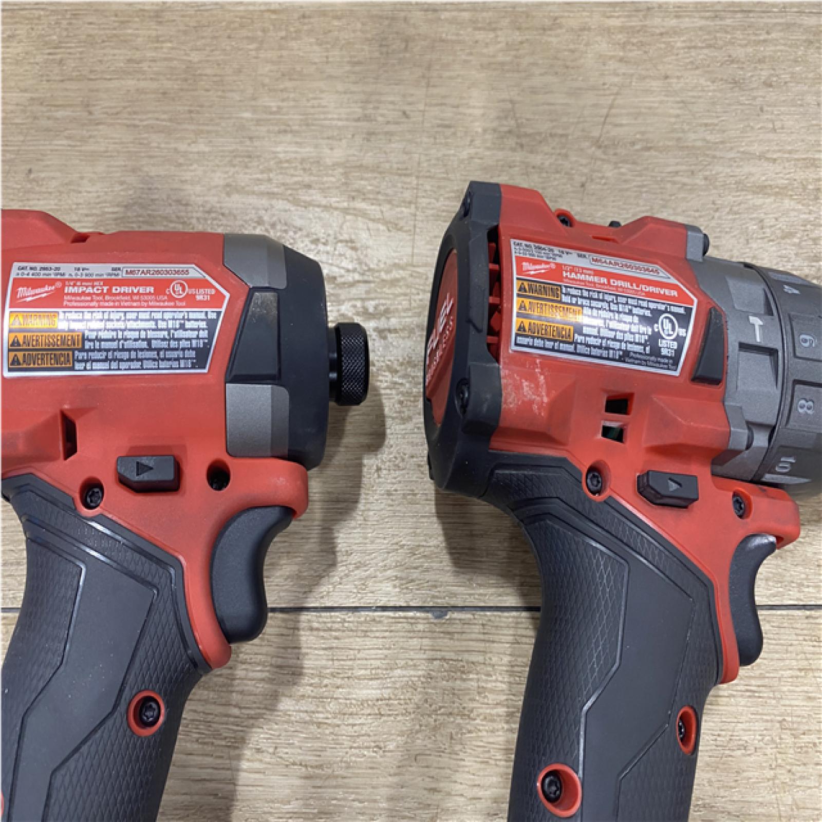 AS-IS Milwaukee FUEL 18V Lithium-Ion Brushless Cordless Hammer Drill and Impact Driver Combo Kit
