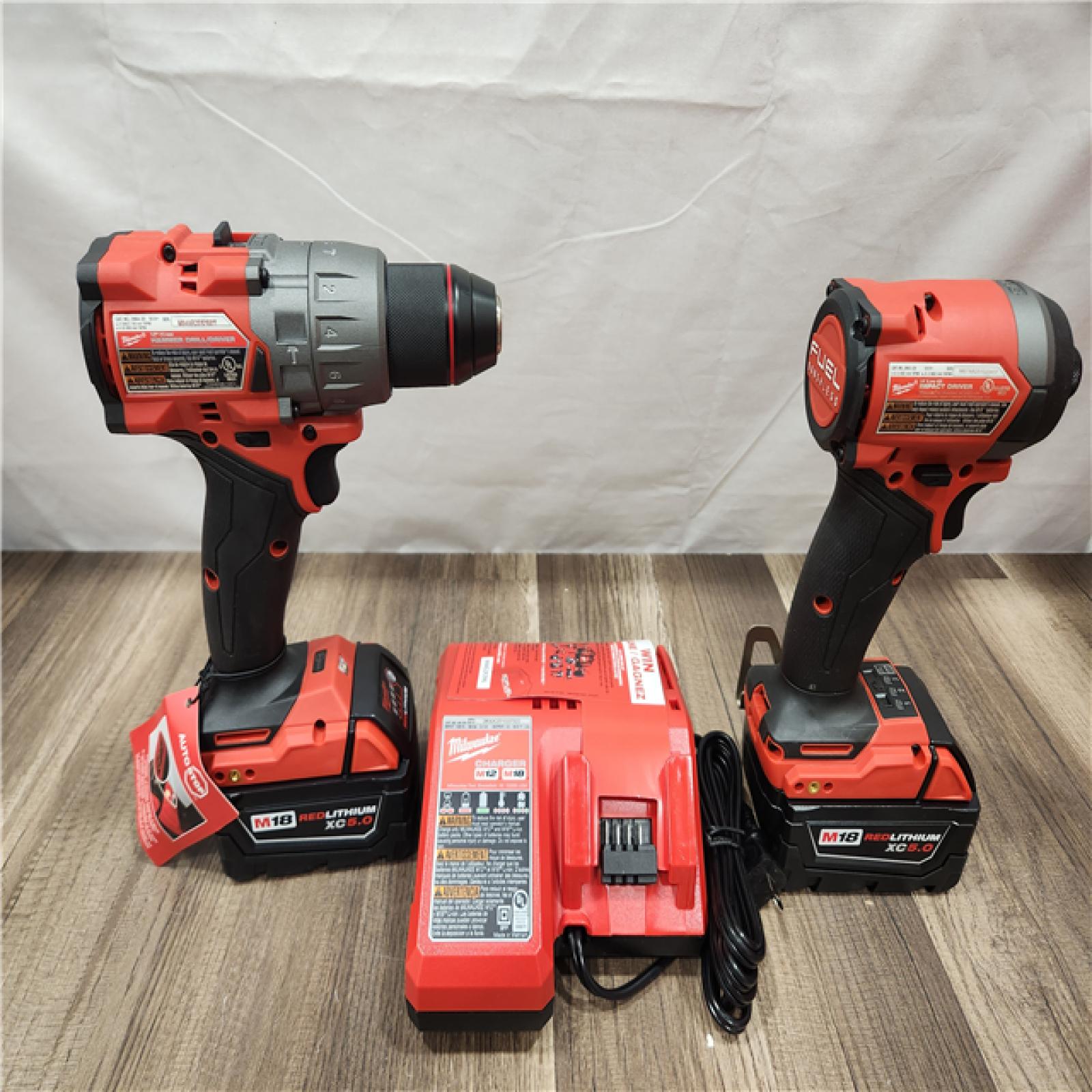 AS-IS- MILWAUKEE FUEL 18V Lithium-Ion Brushless Cordless Hammer Drill and Impact Driver Combo Kit