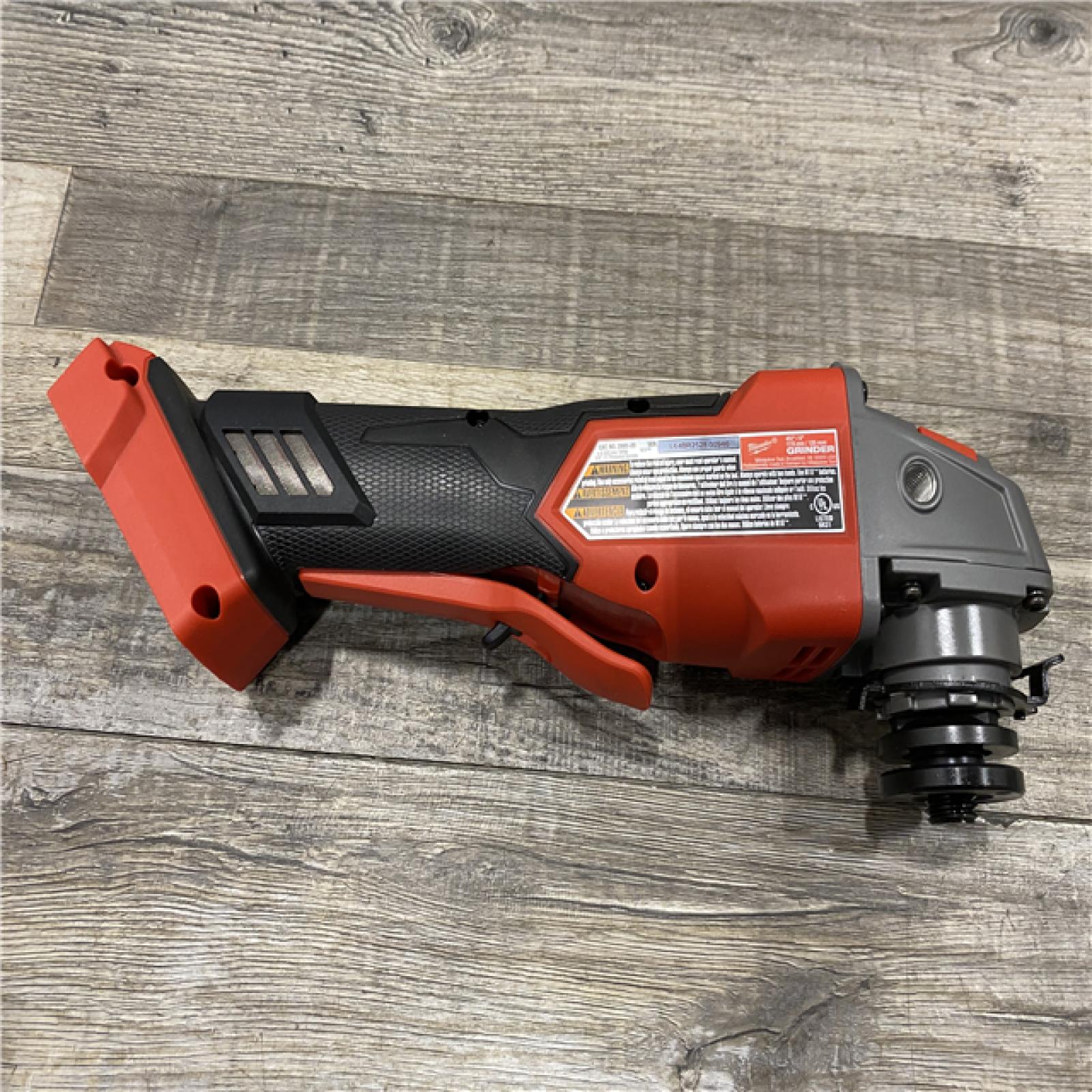 AS-IS Milwaukee FUEL 18V Lithium-Ion Brushless Cordless 4-1/2 in./5 in. Grinder w/Paddle Switch (Tool-Only)