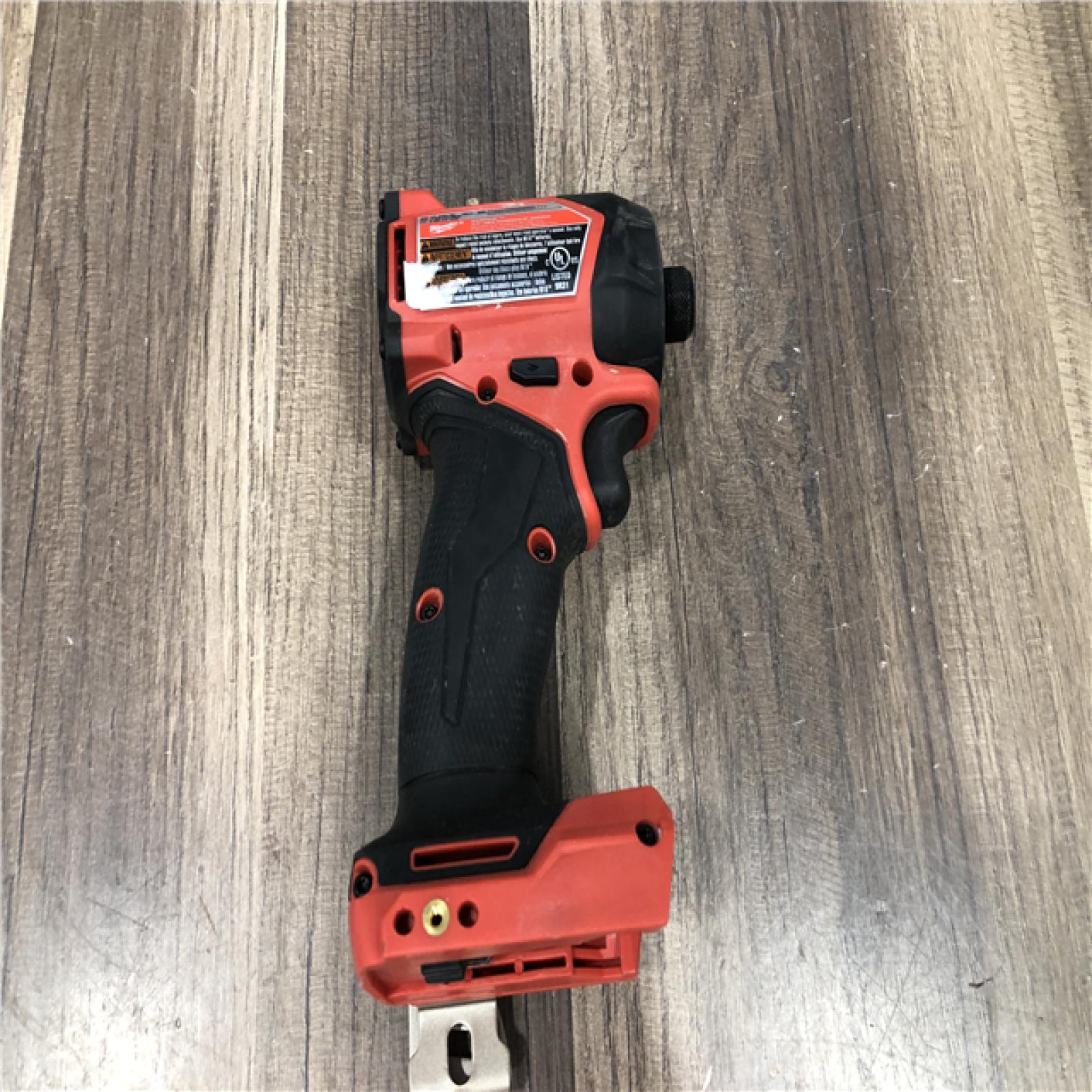 AS-IS Milwaukee FUEL SURGE 18V Lithium-Ion Brushless Cordless 1/4 in. Hex Impact Driver (Tool-Only)