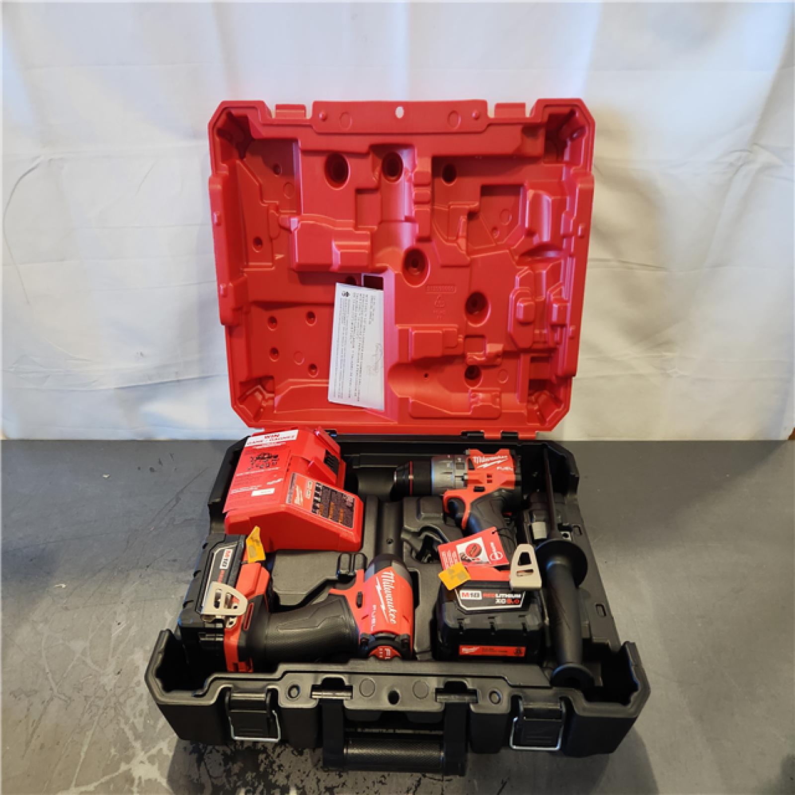 AS-IS- Milwaukee FUEL 18V Lithium-Ion Brushless Cordless Hammer Drill and Impact Driver Combo Kit