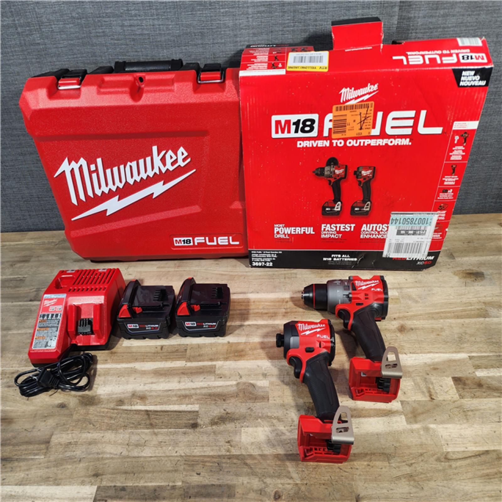 HOUSTON LOCATION - AS-IS (APPEARS LIKE NEW) MILWAUKEE FUEL 18V Lithium-Ion Brushless Cordless Hammer Drill and Impact Driver Combo Kit (2-Tool) with 2 Batteries
