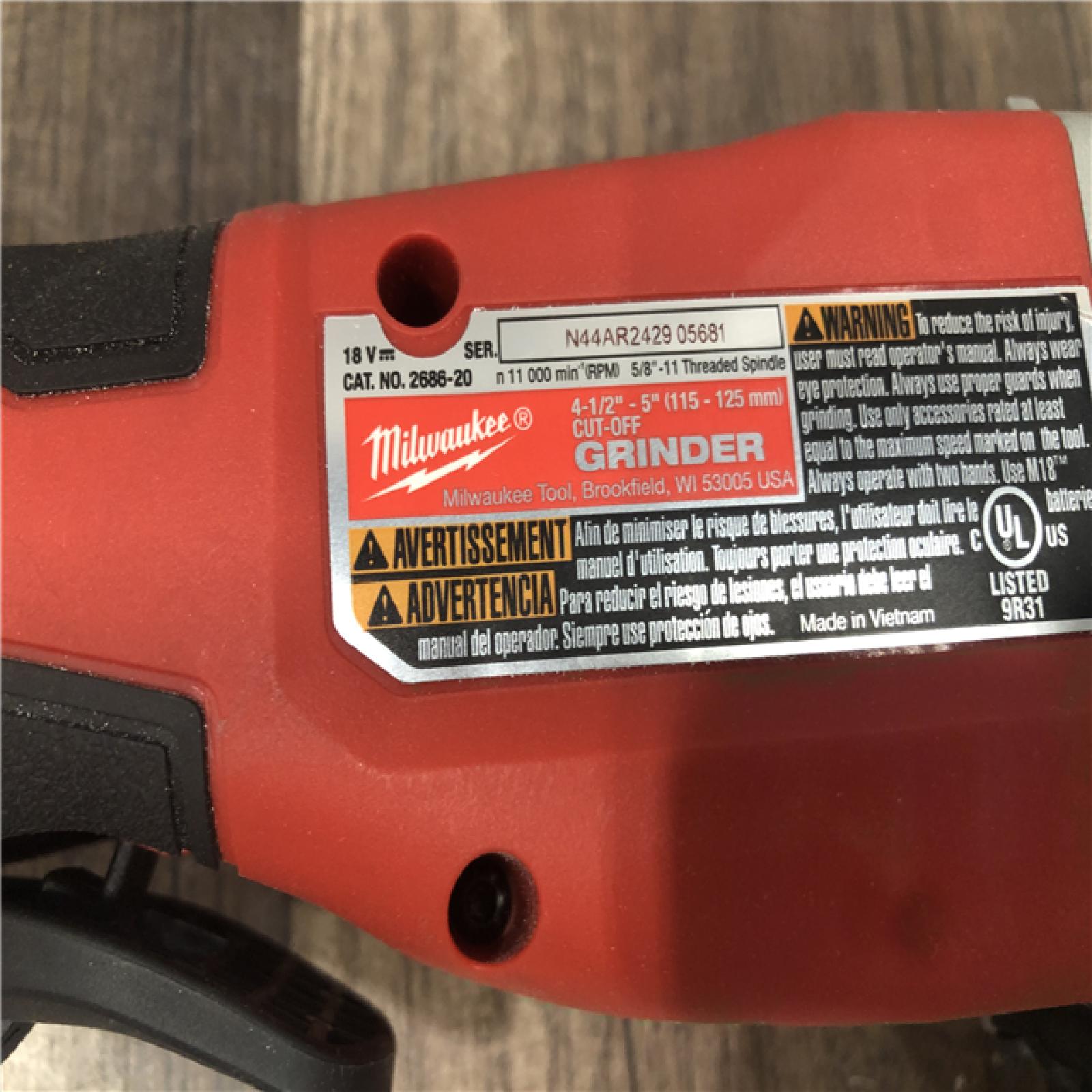 AS-IS Milwaukee 18V Lithium-Ion Brushless Cordless 4-1/2 in./5 in. Grinder w/Paddle Switch (Tool-Only)