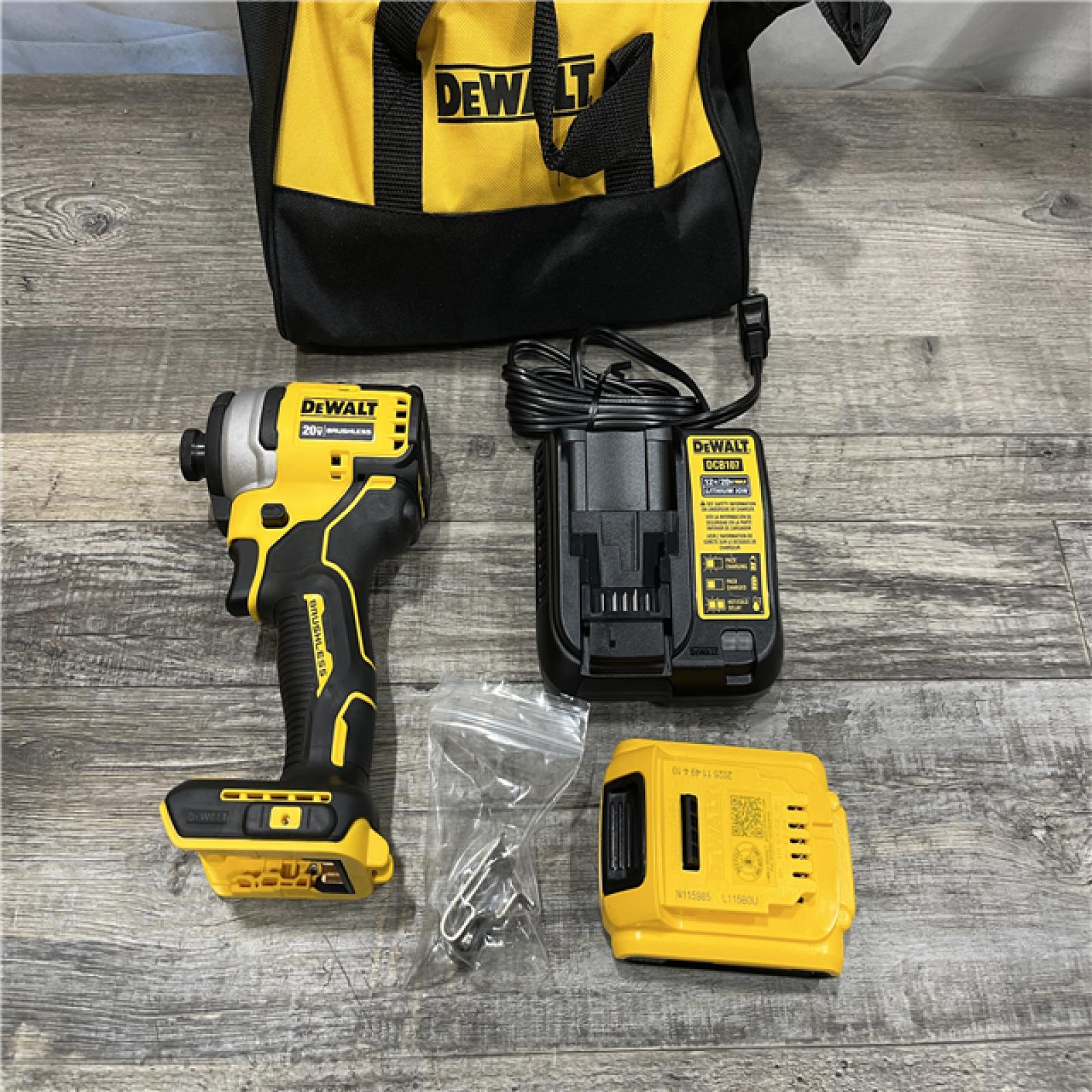 AS-IS DEWALT Atomic 20V Max Lithium-Ion Brushless Cordless Compact 1/4 in. Impact Driver Kit