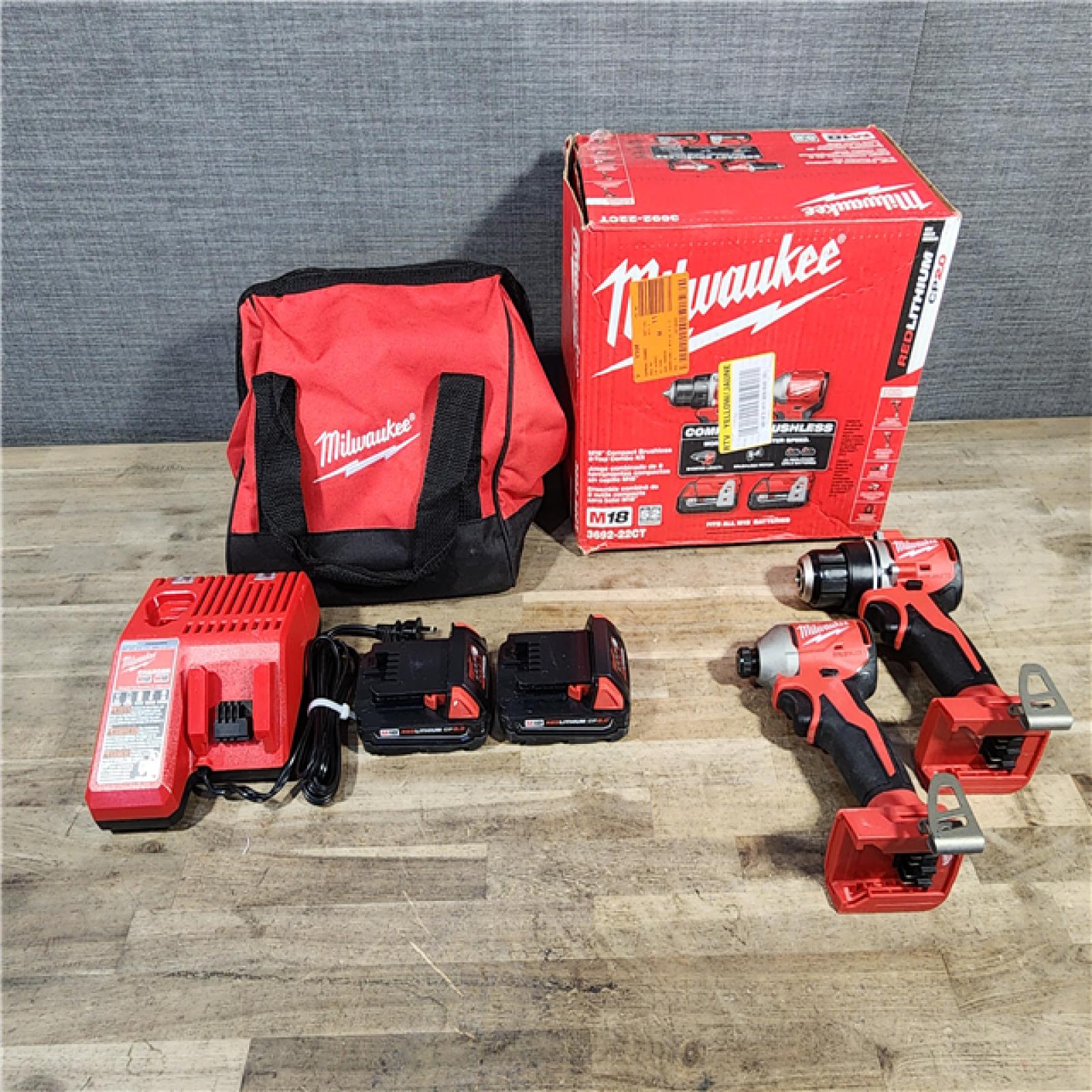 HOUSTON LOCATION - AS-IS Milwaukee M18 18V Lithium-Ion Brushless Cordless Compact Drill/Impact Combo Kit (2-Tool) W/(2) 2.0 Ah Batteries, Charger & Bag
