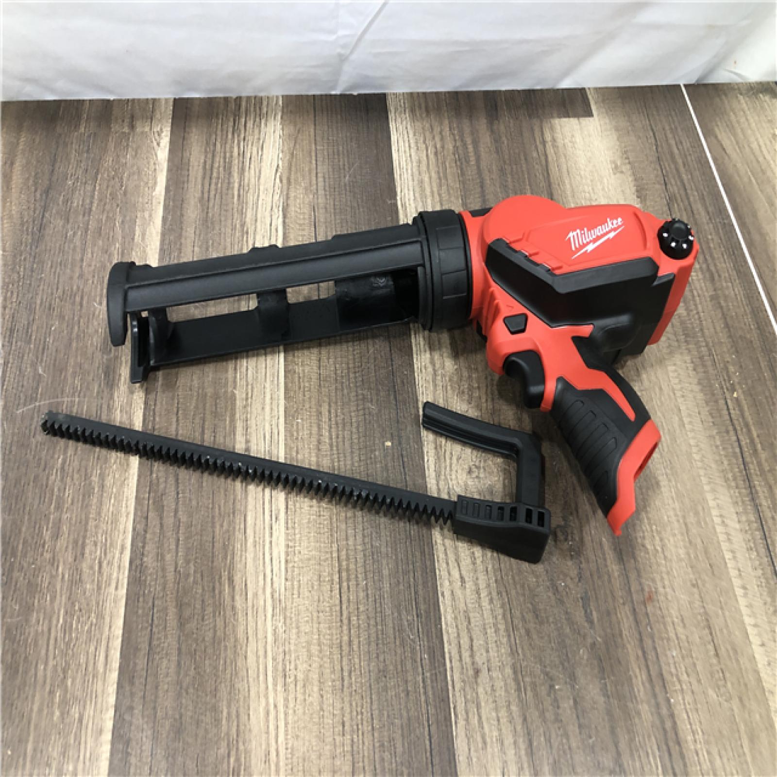 AS-IS Milwaukee 12V Lithium-Ion Cordless 10 oz. Adhesive and Caulk Gun (Tool-Only)