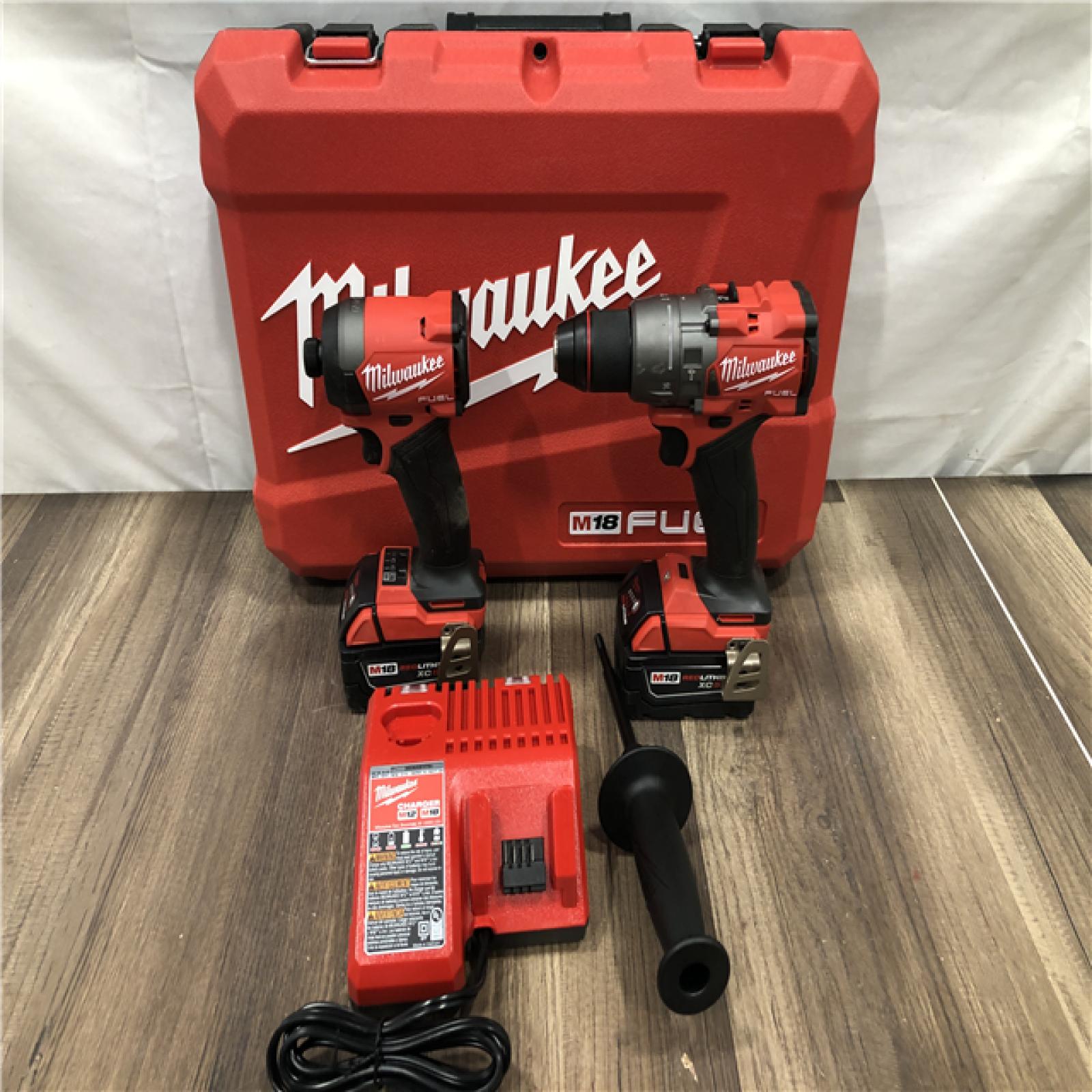 AS-IS Milwaukee FUEL 18V Lithium-Ion Brushless Cordless Hammer Drill and Impact Driver Combo Kit