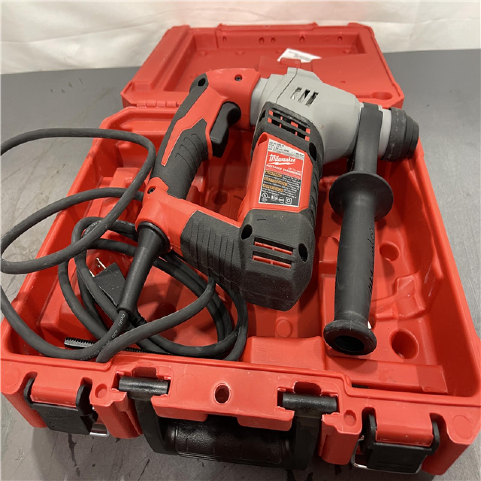 AS-IS - Milwaukee 5.5 Amp 5/8 in. Corded SDS-plus Concrete/Masonry Rotary Hammer Drill Kit with Case