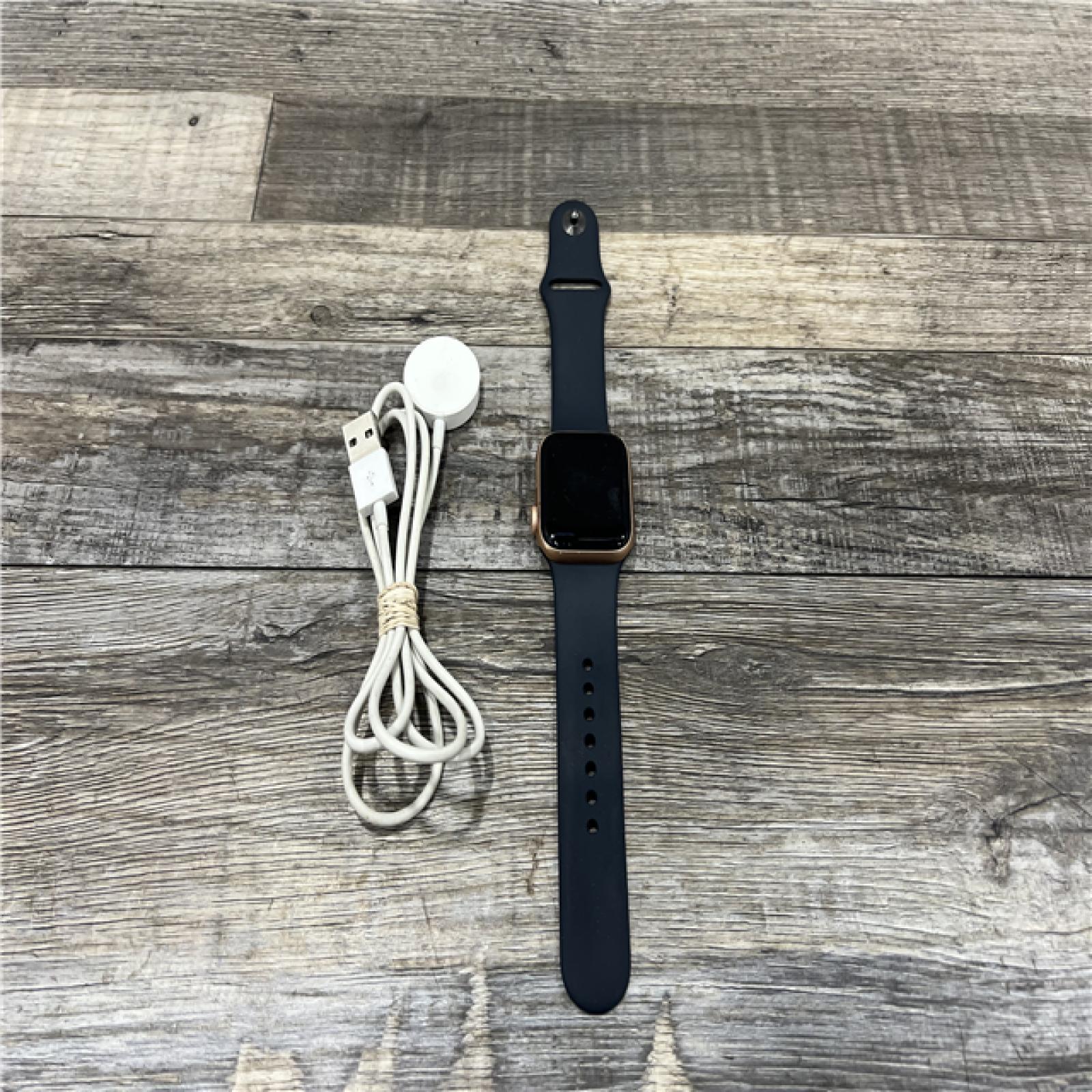 AS-IS Apple Watch Series SE (GPS,LTE 40mm) - Gold Aluminum Case/Navy Blue Sport Band - WR-50 METERS