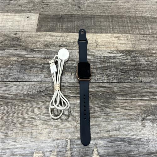 AS-IS Apple Watch Series SE (GPS,LTE 40mm) - Gold Aluminum Case/Navy Blue Sport Band - WR-50 METERS