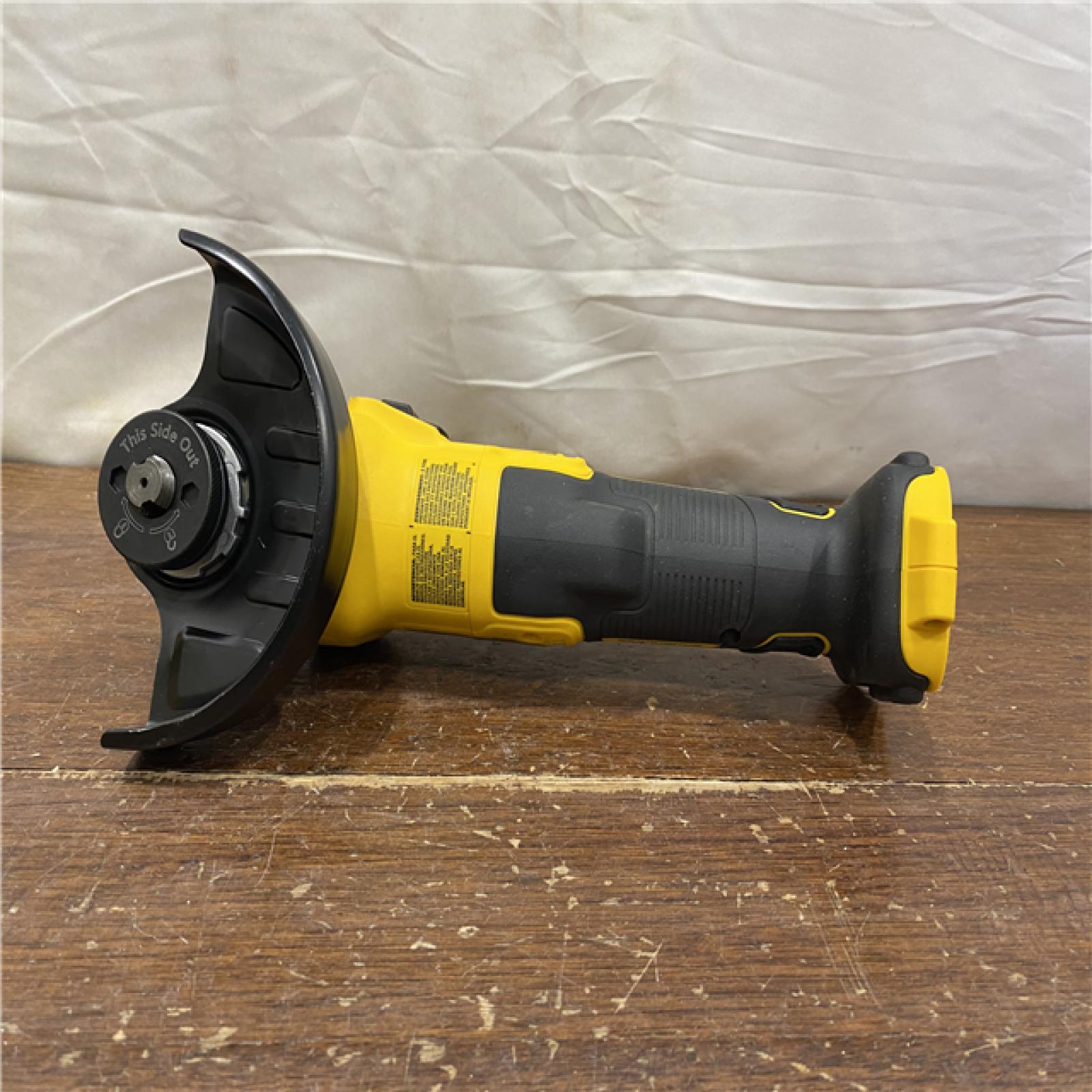 AS-IS DeWalt DCG405B 20V Max XR 4.5-Inch Slide Switch Small Angle Grinder (Tool Only)