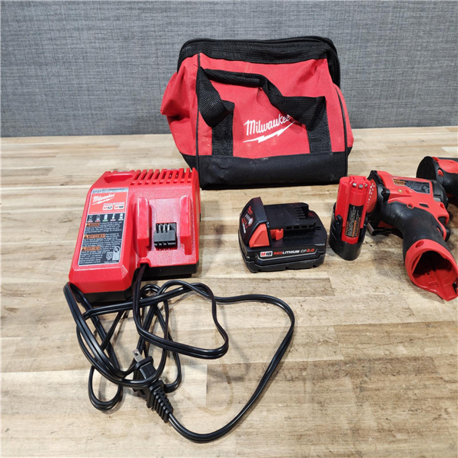 HOUSTON LOCATION - AS - IS Milwaukee 2 Tool Combo Kit W/ (2) Battery & Charger