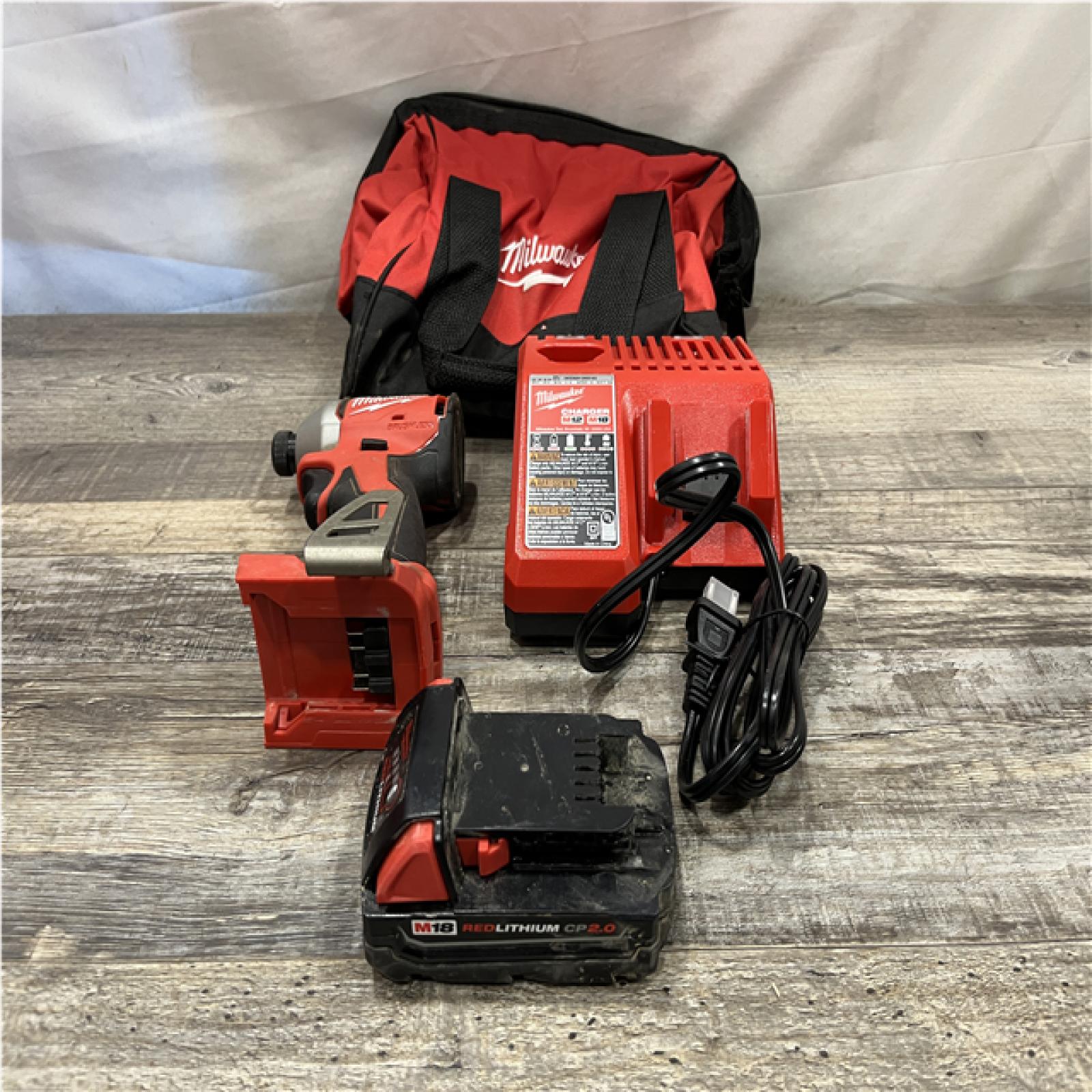 AS-IS Milwaukee 18-Volt Lithium-Ion Compact Brushless Cordless 1/4 in. Impact Driver Kit