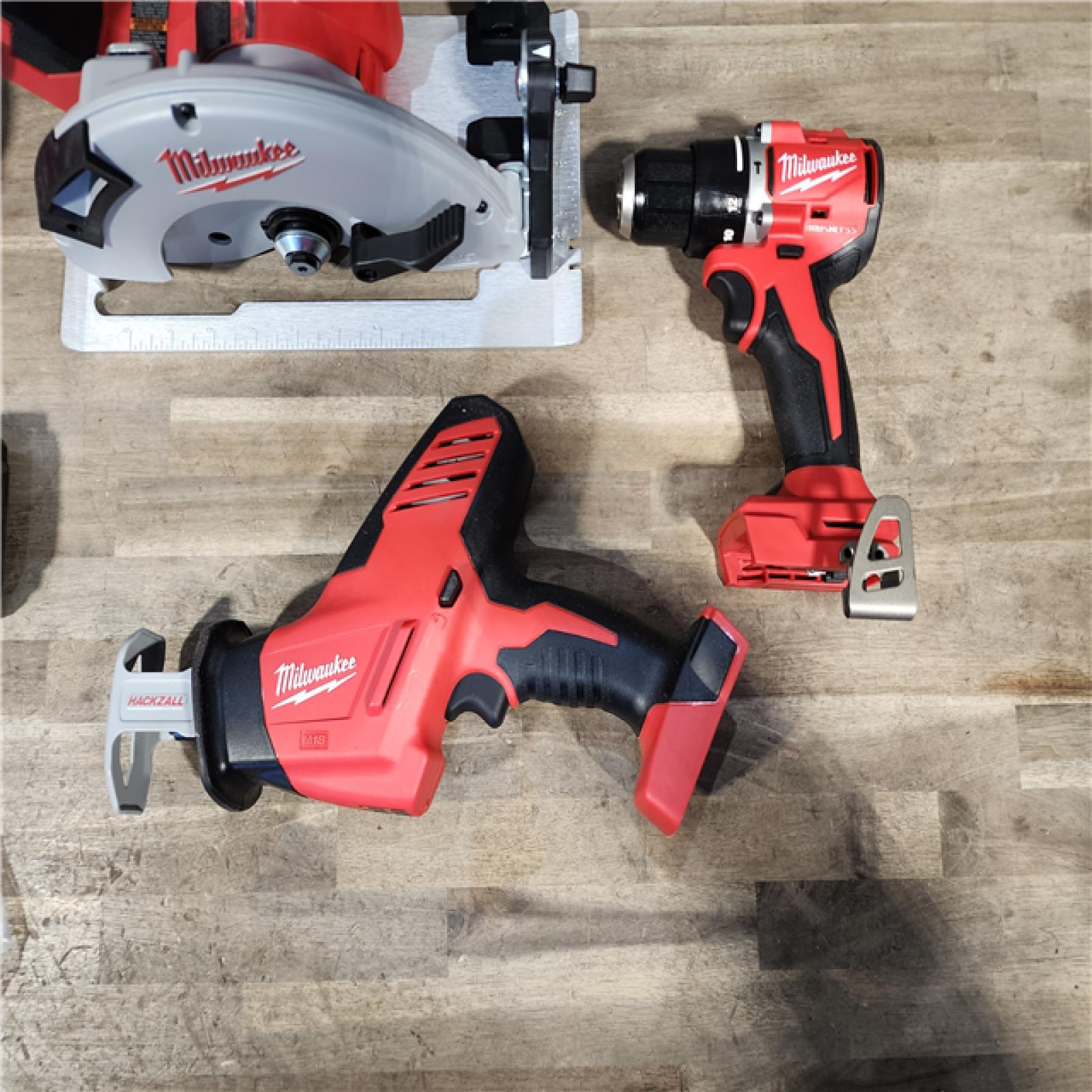 HOUSTON LOCATION - AS-IS Milwaukee M18 18-Volt Lithium-Ion Brushless Cordless Combo Kit (3-Tool) with 2-Batteries  1-Charger and Tool Bag