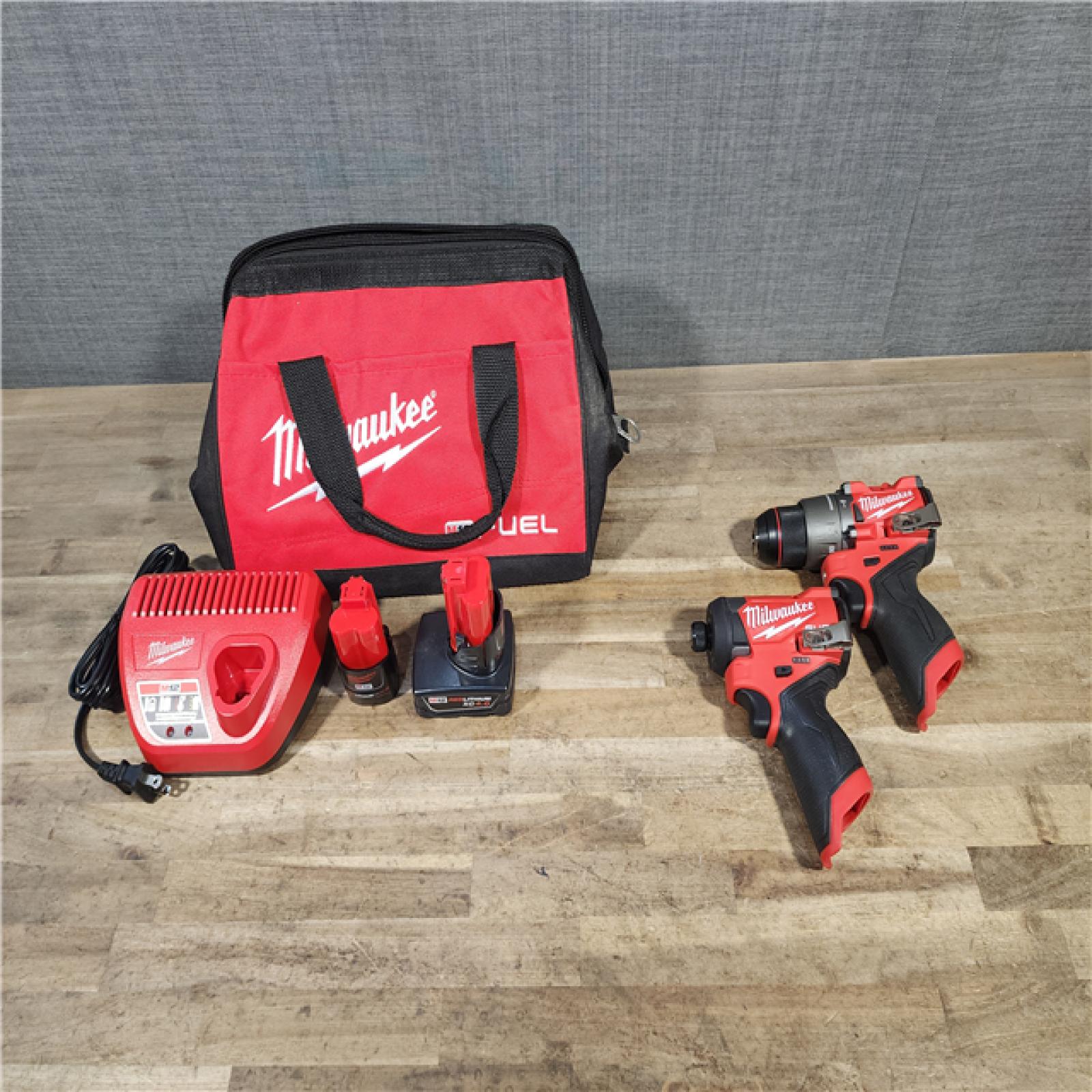 HOUSTON LOCATION - AS-IS Milwaukee FUEL 12-Volt Lithium-Ion Brushless Cordless Hammer Drill and Impact Driver Combo Kit