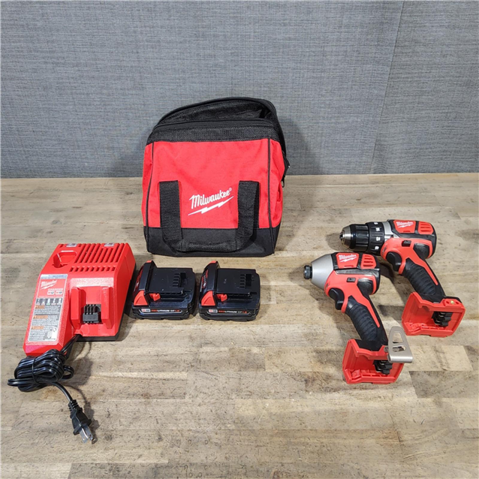 HOUSTON LOCATION - AS-IS Milwaukee M18 Brushed Cordless (2-Tool) Drill/Driver and Impact Driver Kit