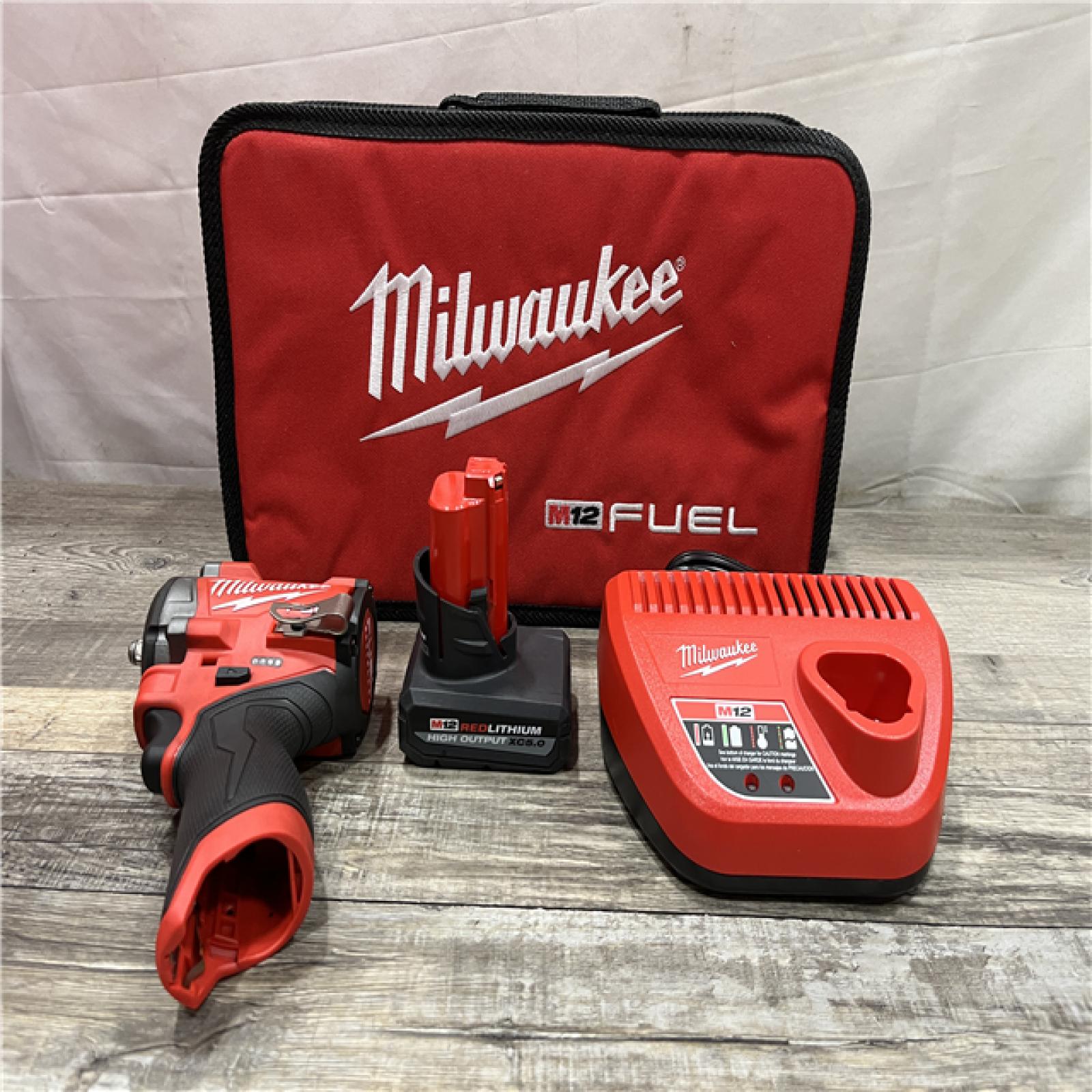 AS-IS Milwaukee FUEL 12V Li-Ion Brushless Cordless Stubby 3/8 in. Impact Wrench Kit