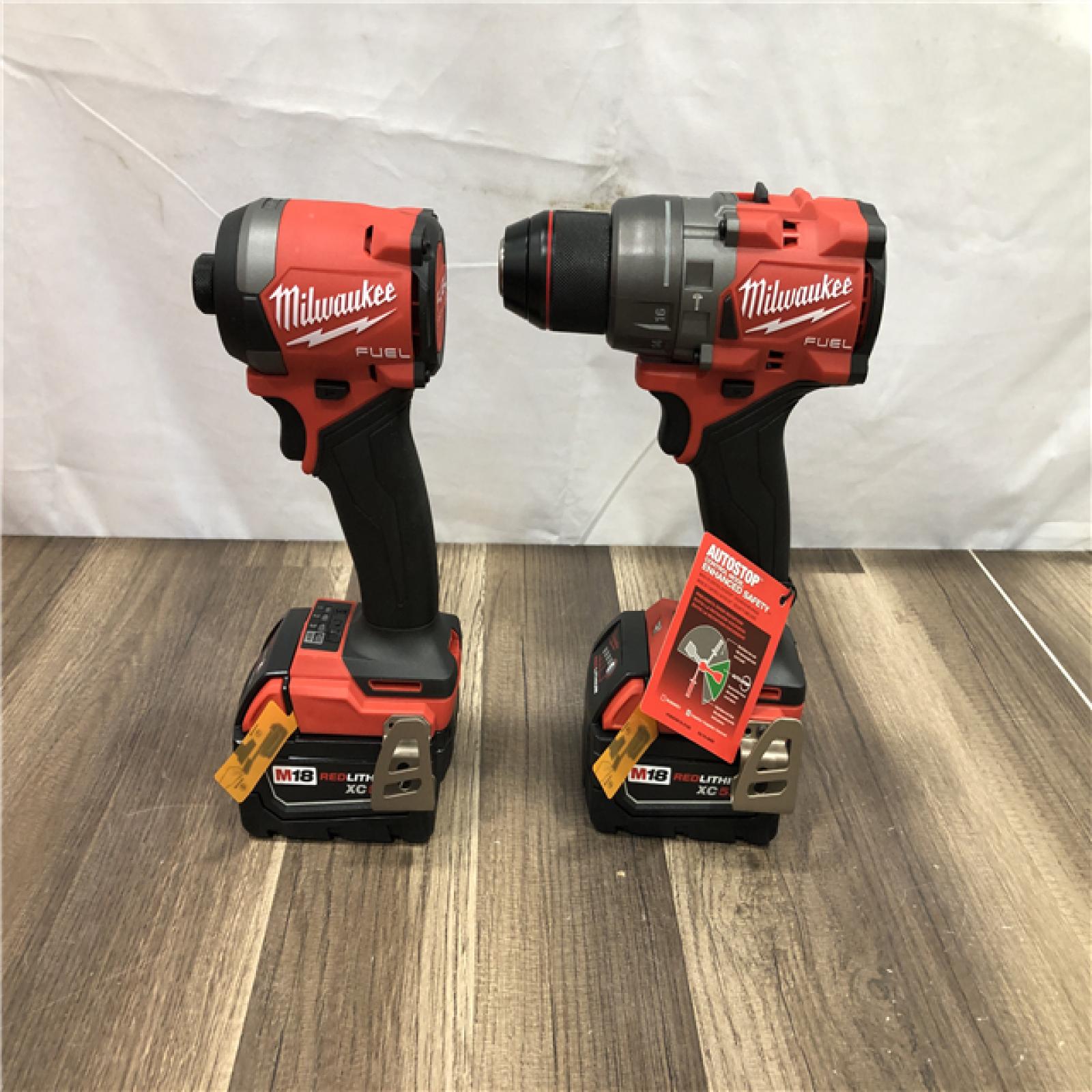 AS-IS Milwaukee FUEL 18V Lithium-Ion Brushless Cordless Hammer Drill and Impact Driver Combo Kit