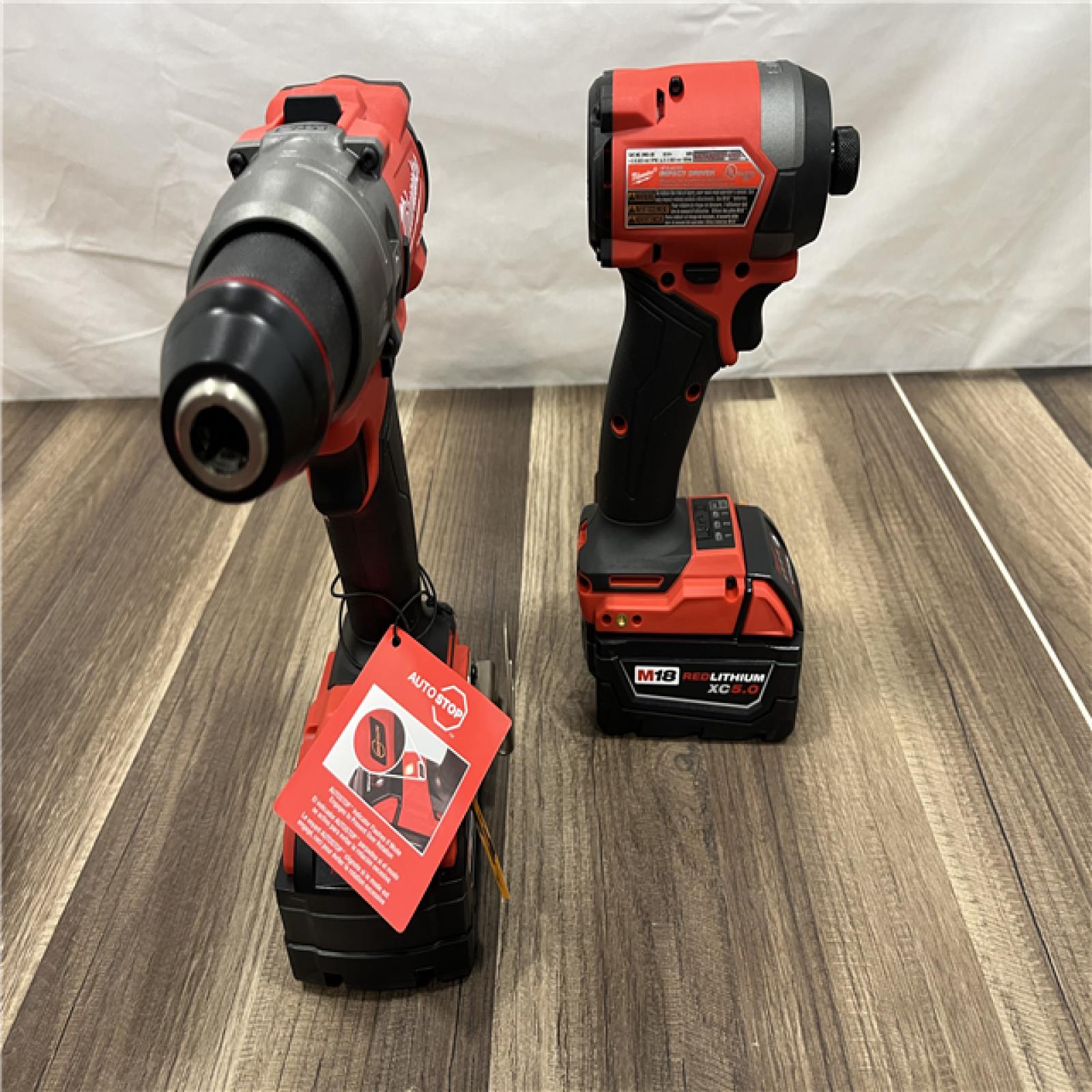 AS-IS Milwaukee M18 FUEL 18V Lithium-Ion Brushless Cordless Hammer Drill and Impact Driver Combo Kit (2-Tool) with 2 Batteries