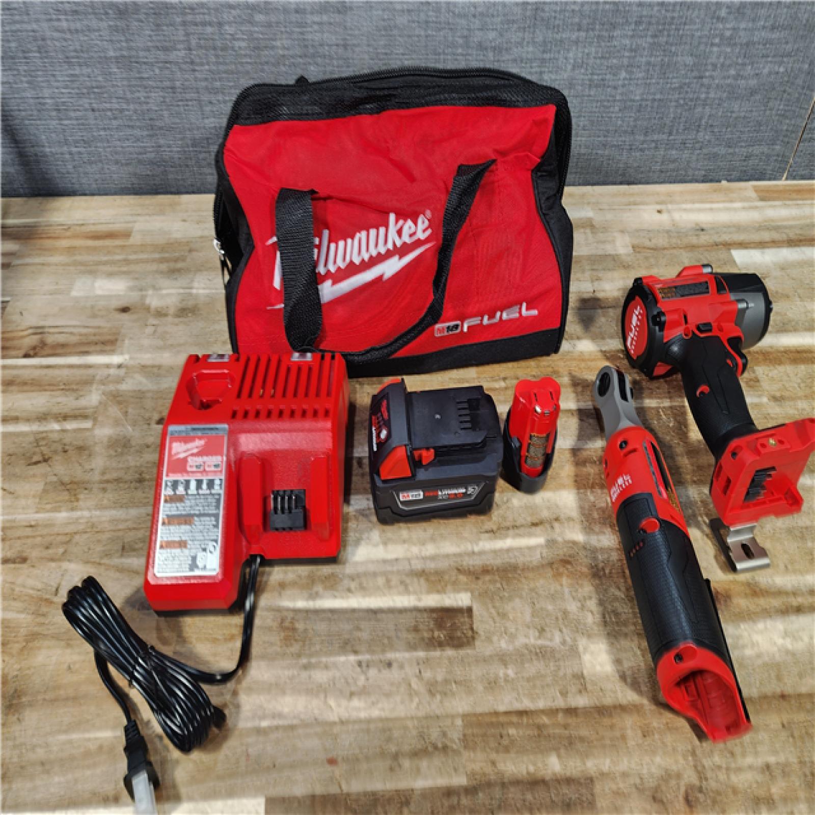 HOUSTON LOCATION - AS - IS M18 FUEL 18V Cordless Mid Torque 1/2 in. Impact Wrench W/ M12 FUEL 3/8 in. Ratchet & Battery/Charger Combo Kit