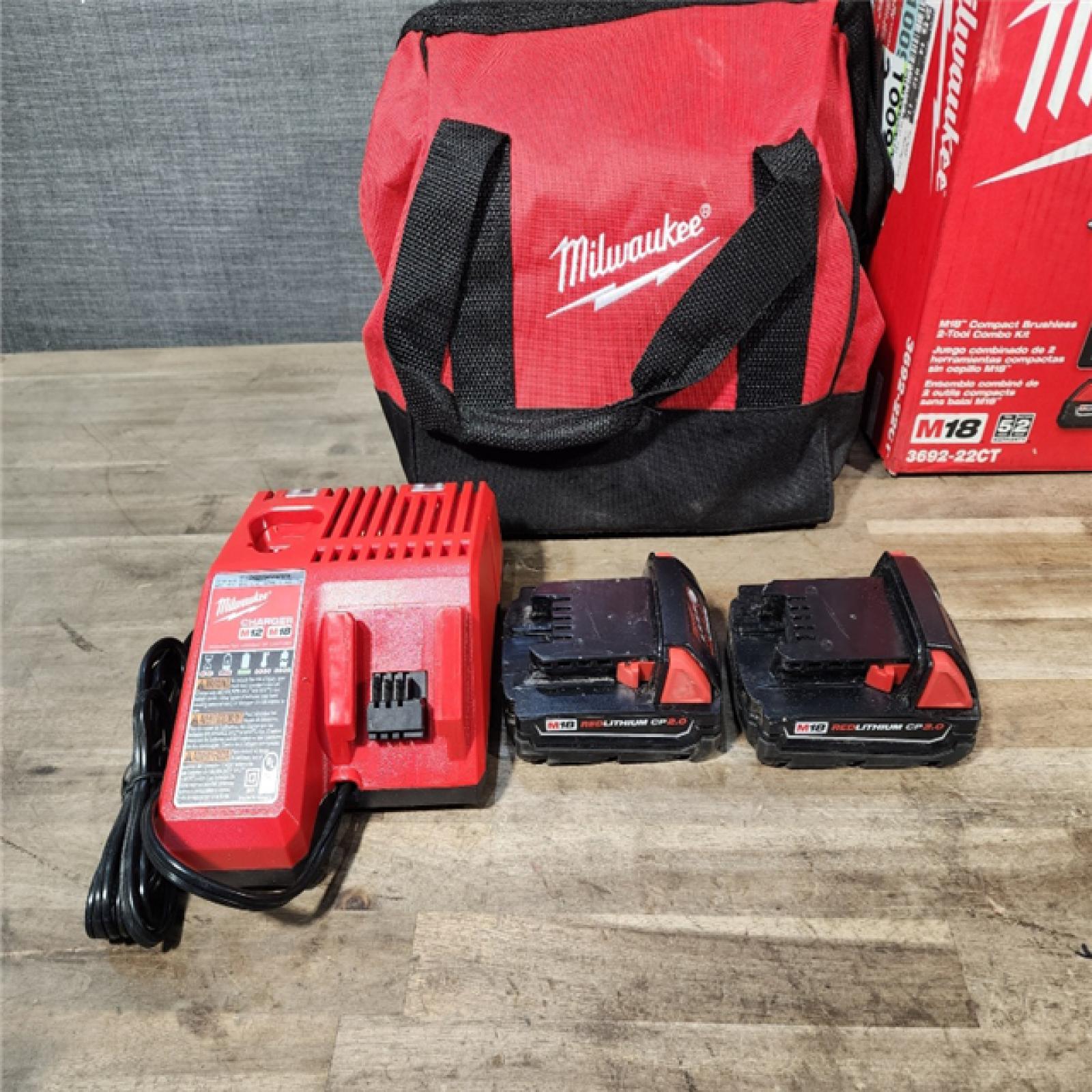 HOUSTON LOCATION - AS-IS Milwaukee M18 18V Lithium-Ion Brushless Cordless Compact Drill/Impact Combo Kit (2-Tool) W/(2) 2.0 Ah Batteries, Charger & Bag