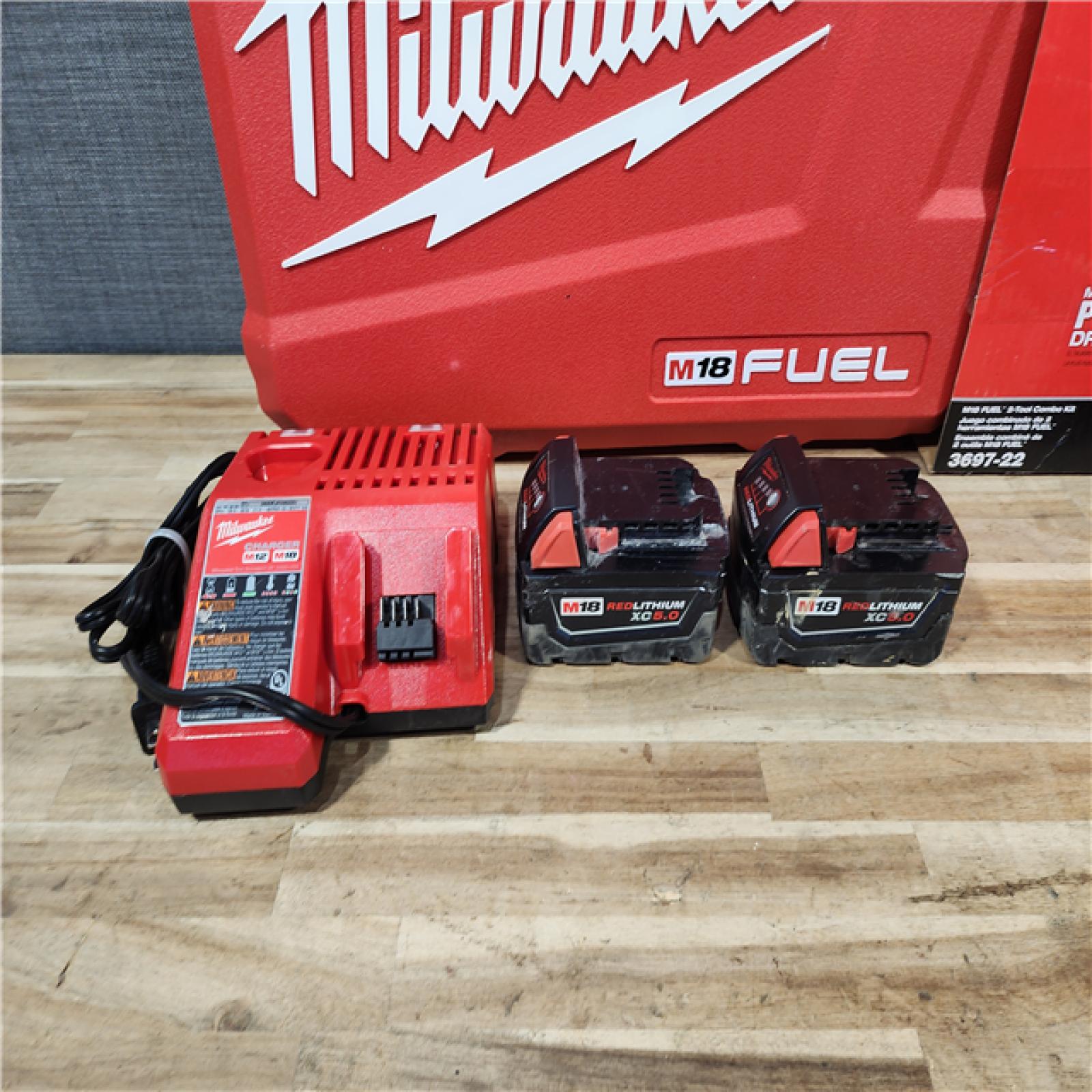 HOUSTON LOCATION - AS-IS Milwaukee FUEL 18V Lithium-Ion Brushless Cordless Hammer Drill and Impact Driver Combo Kit