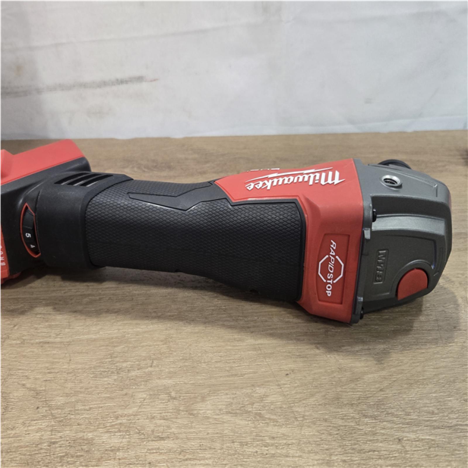 AS-IS Milwaukee FUEL 18V Lithium-Ion Brushless Cordless 4-1/2 in./5 in. Grinder with Variable Speed & Paddle Switch (Tool-Only)