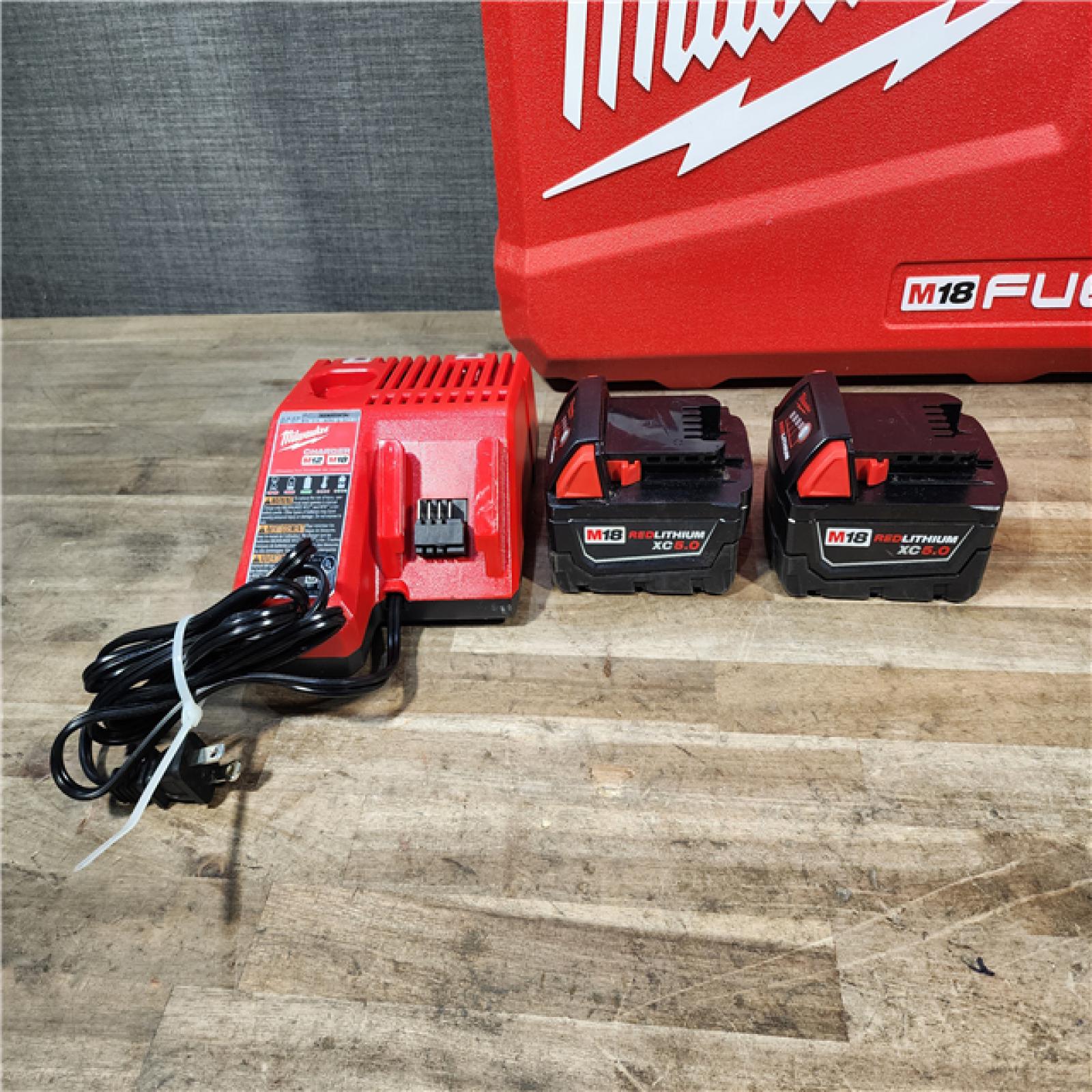 HOUSTON LOCATION - AS-IS Milwaukee FUEL 18V Lithium-Ion Brushless Cordless Hammer Drill and Impact Driver Combo Kit