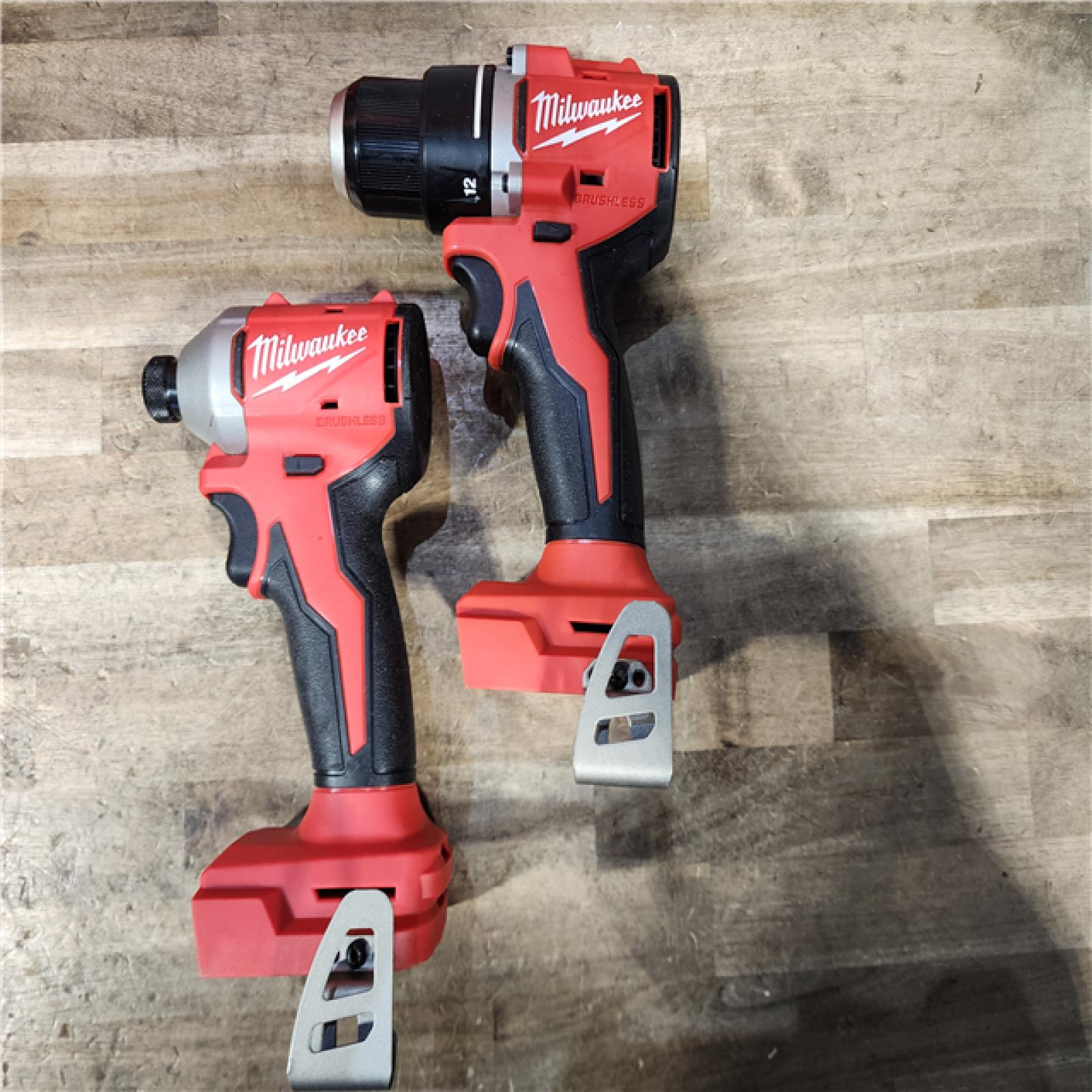HOUSTON LOCATION - AS-IS Milwaukee M18 18V Lithium-Ion Brushless Cordless Compact Drill/Impact Combo Kit (2-Tool) W/(2) 2.0 Ah Batteries  Charger & Bag
