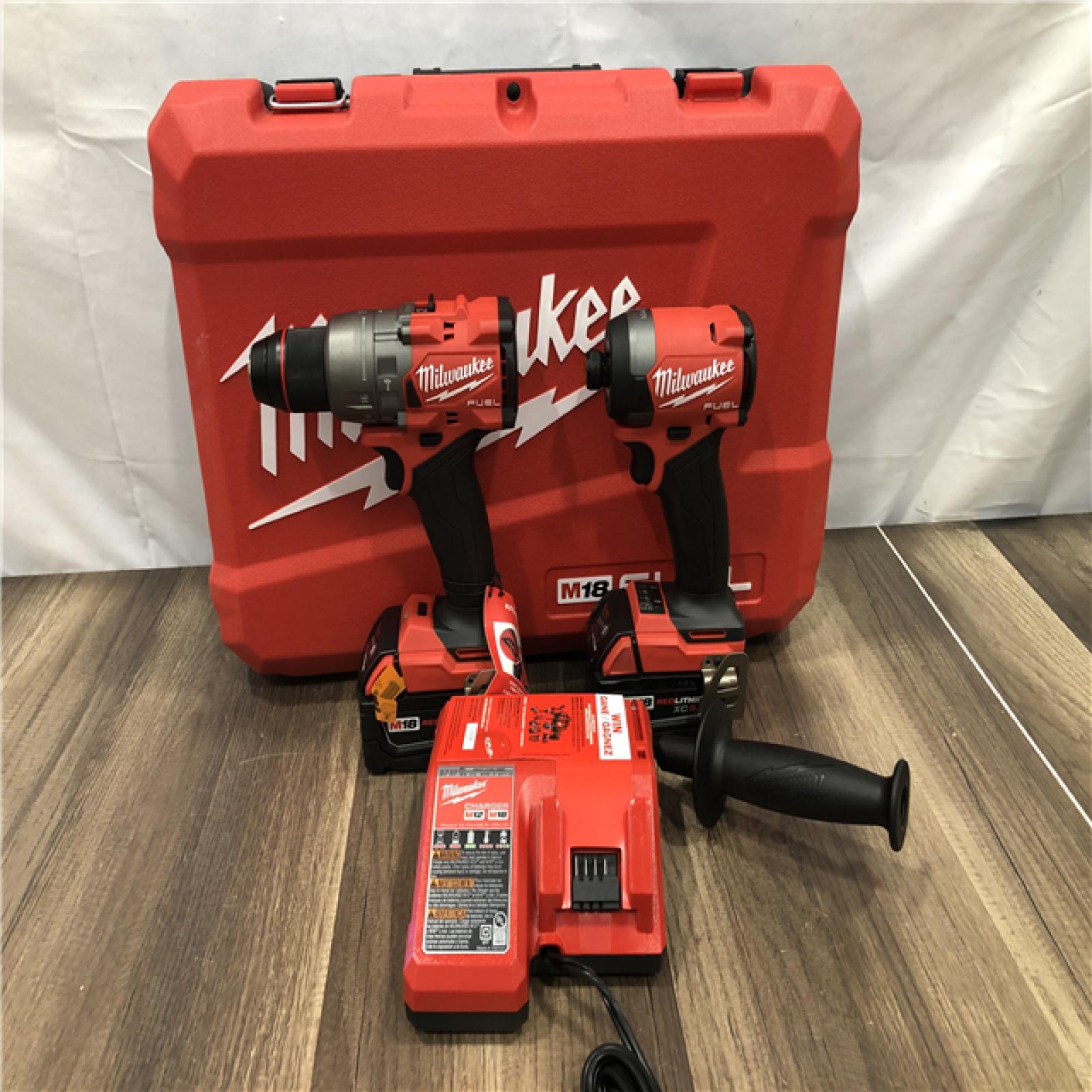 AS-IS Milwaukee FUEL 18V Lithium-Ion Brushless Cordless Hammer Drill and Impact Driver Combo Kit