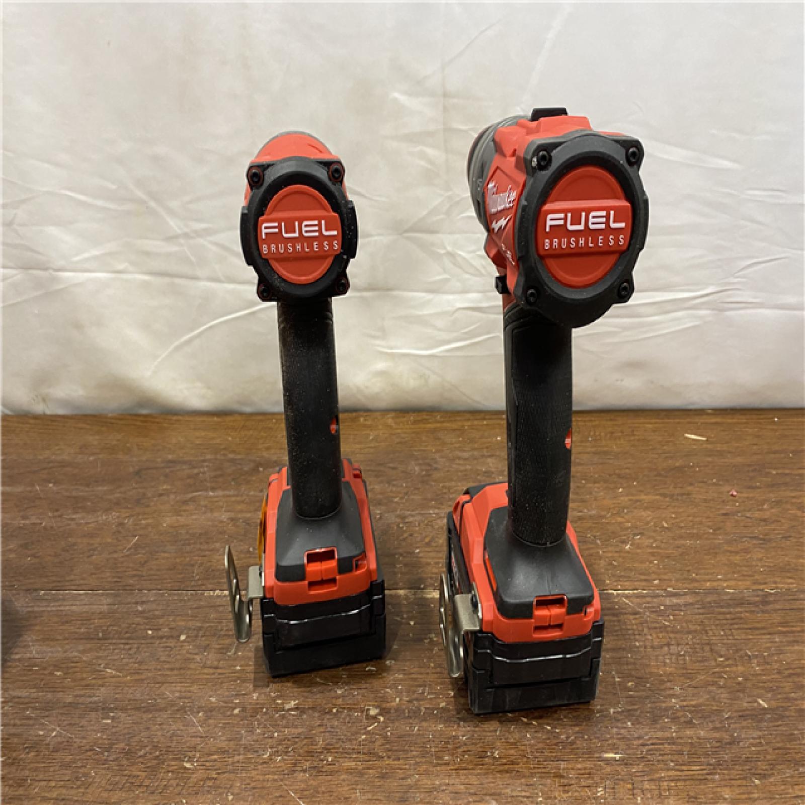 AS-IS MILWAUKEE M18 FUEL 18V Lithium-Ion Brushless Cordless Hammer Drill and Impact Driver Combo Kit (2-Tool) with 2 Batteries