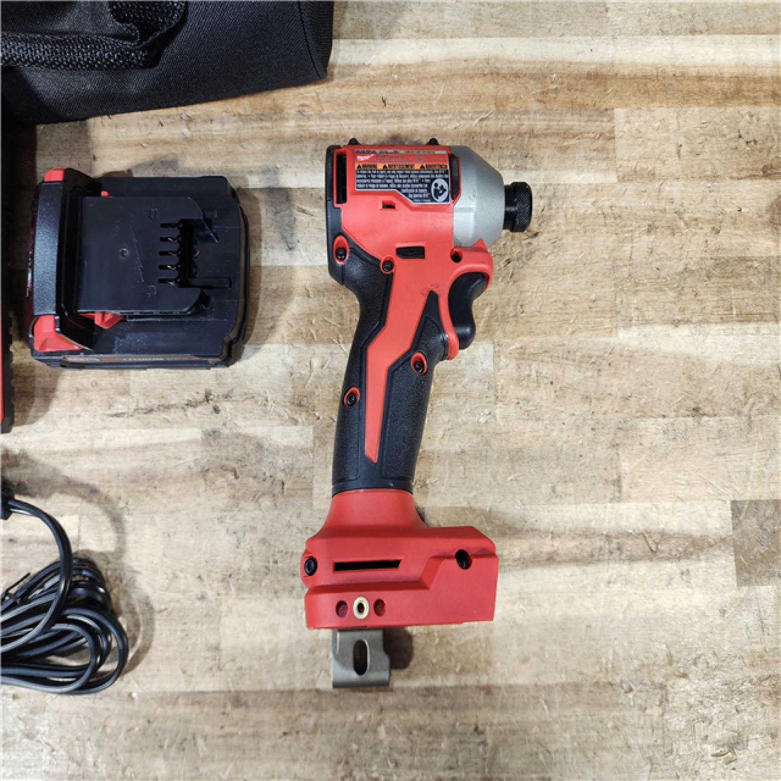 HOUSTON LOCATION - AS - IS Milwaukee 18-Volt Lithium-Ion Compact Brushless Cordless 1/4 in. Impact Driver Kit
