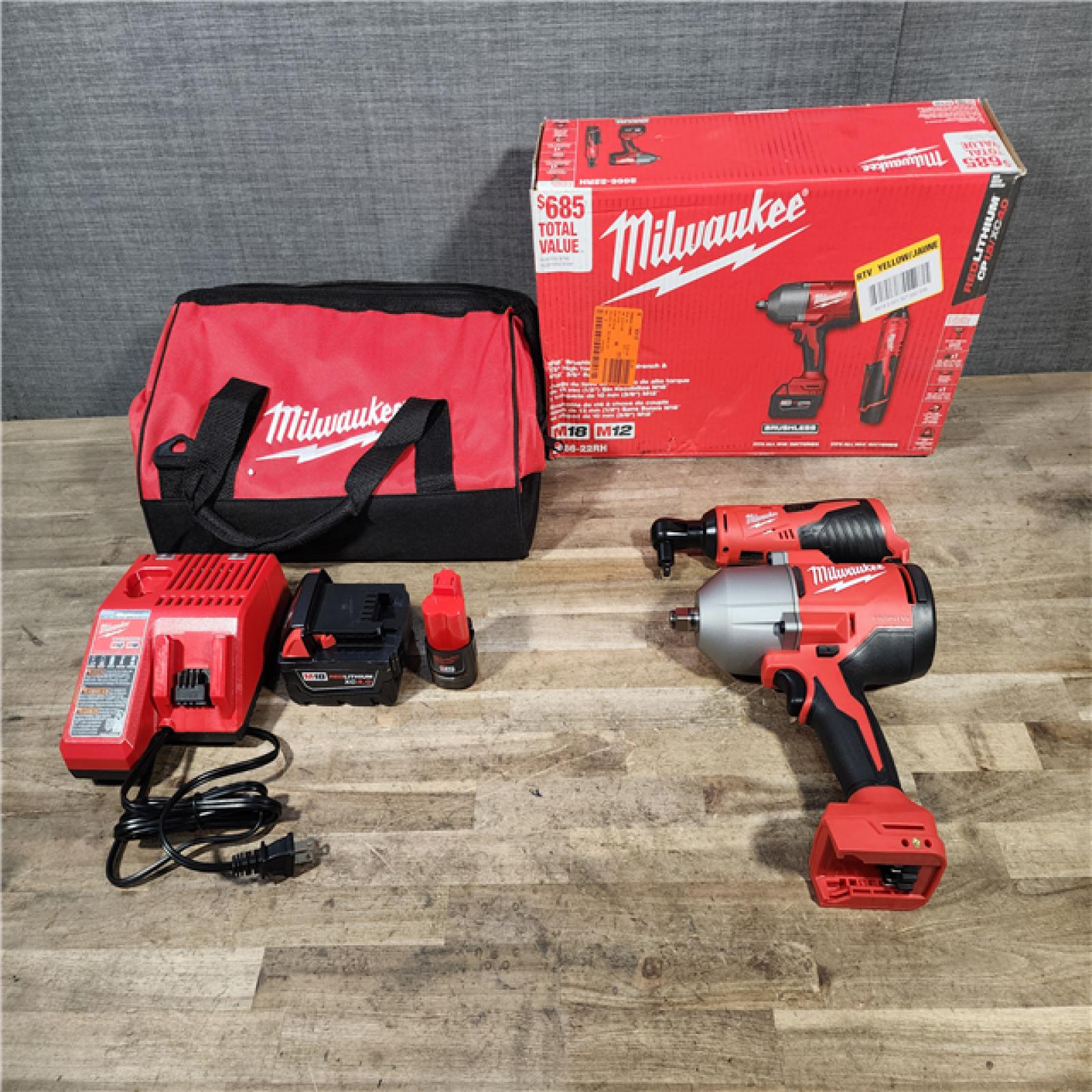 HOUSTON LOCATION - AS-IS Milwaukee 12/18V Lithium-Ion Cordless 3/8 in. Ratchet and 1/2 in. High Torque Impact Wrench with Friction Ring Combo Kit