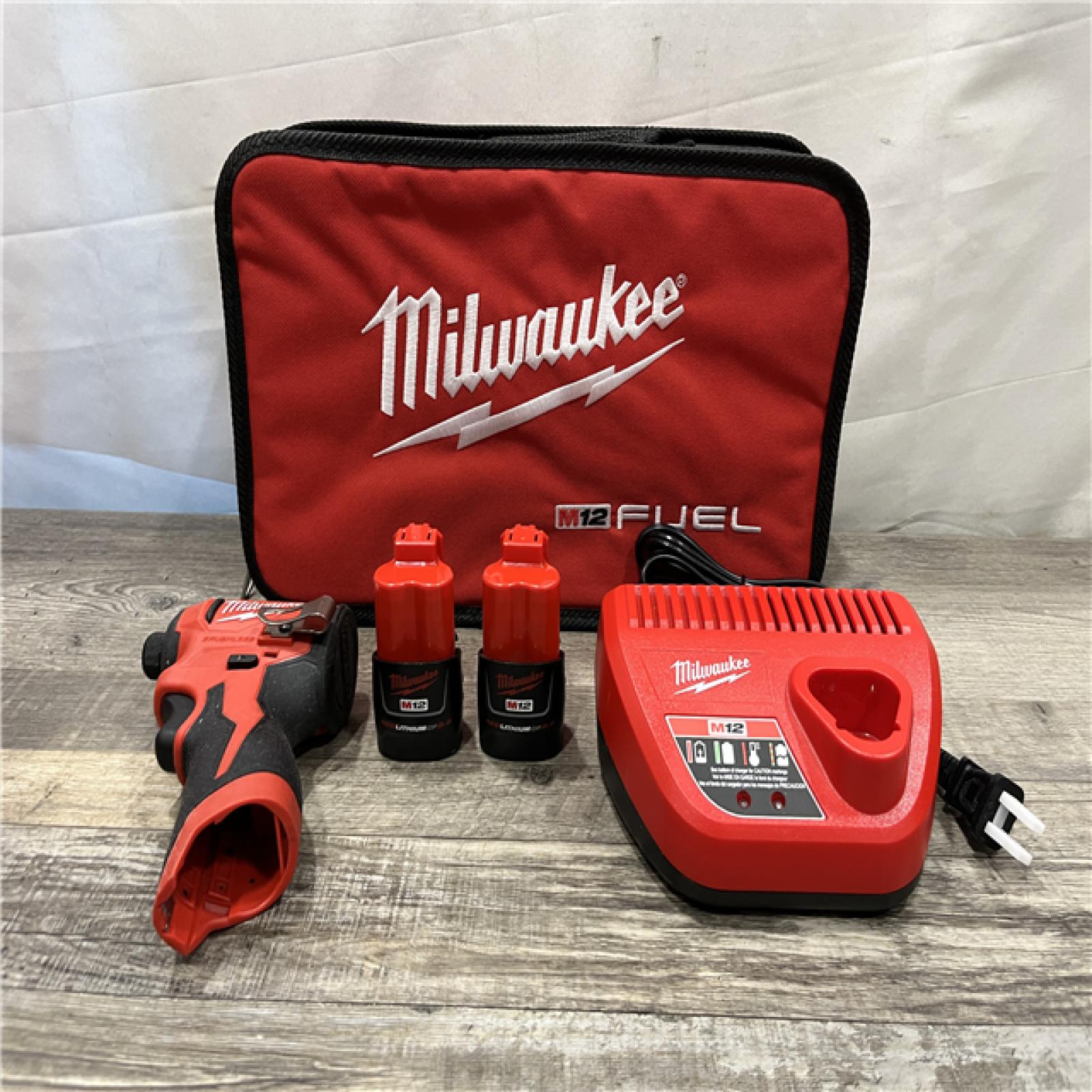 AS-IS Milwaukee 12-Volt Lithium-Ion Compact Brushless Cordless 1/4 in. Impact Driver Kit