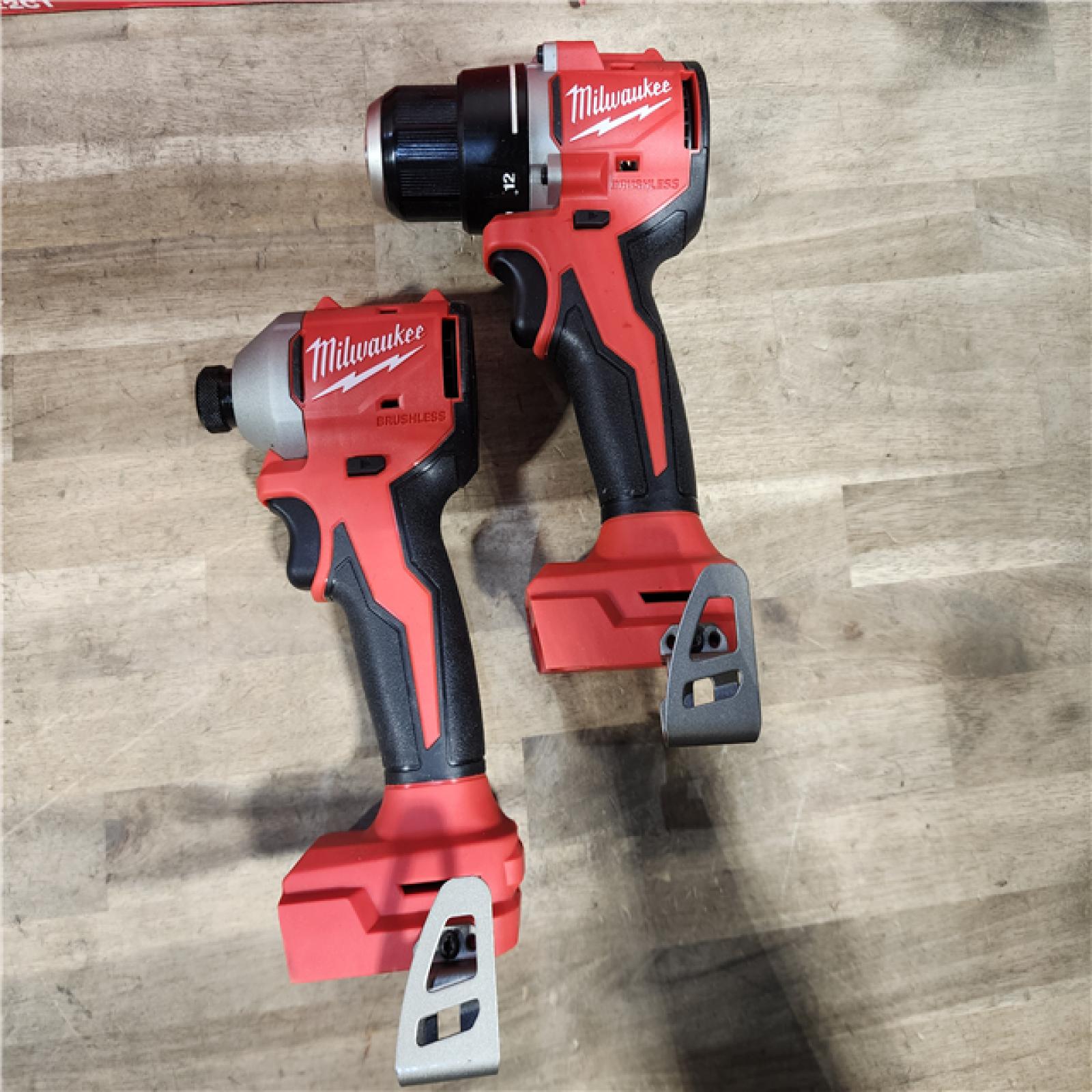HOUSTON LOCATION - AS-IS Milwaukee M18 18V Lithium-Ion Brushless Cordless Compact Drill/Impact Combo Kit (2-Tool) W/(2) 2.0 Ah Batteries, Charger & Bag