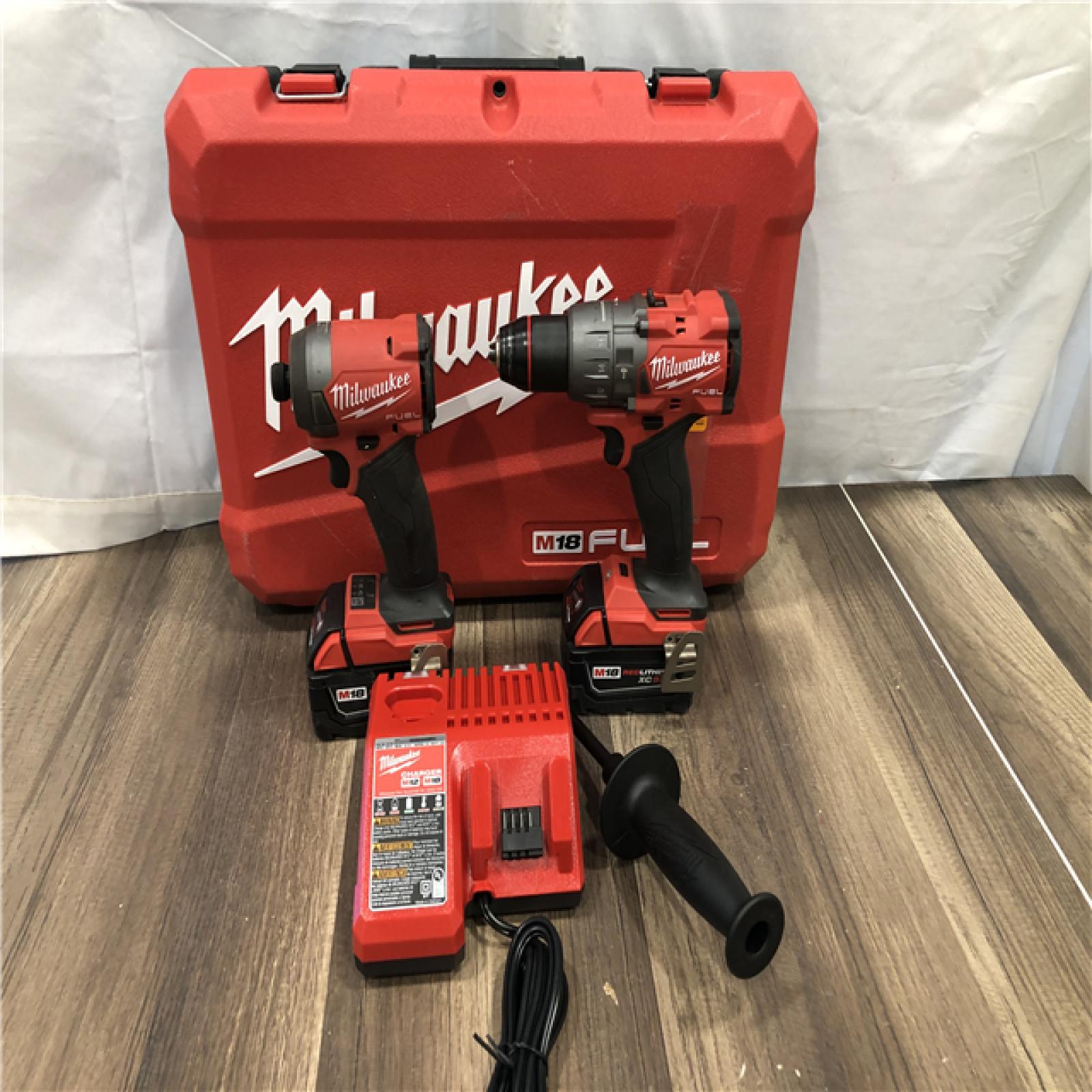 AS-IS Milwaukee FUEL 18V Lithium-Ion Brushless Cordless Hammer Drill and Impact Driver Combo Kit