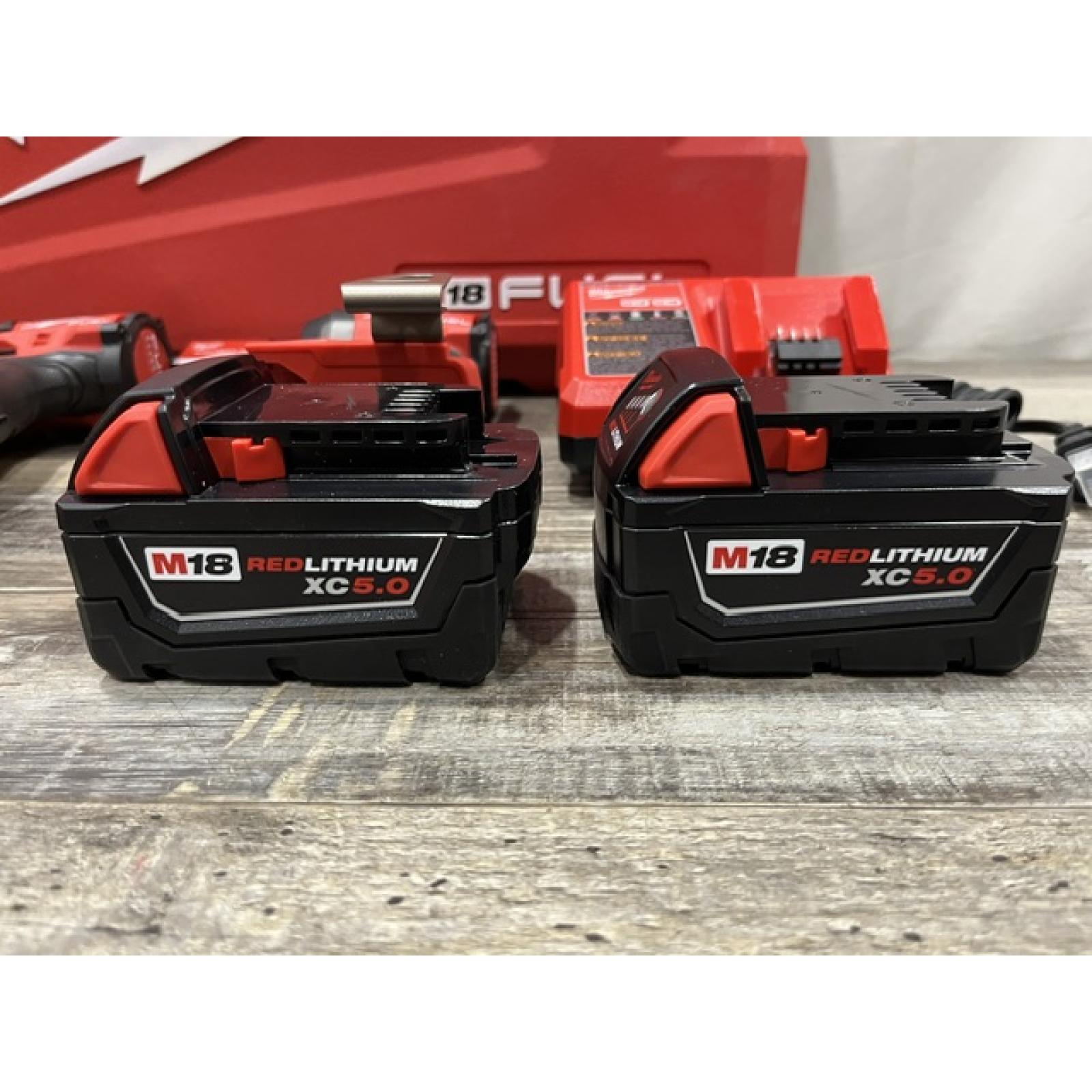 AS-IS Milwaukee FUEL 18V Lithium-Ion Brushless Cordless Hammer Drill and Impact Driver Combo Kit