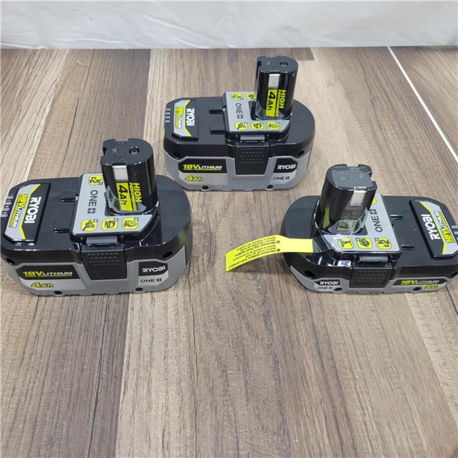 AS-IS RYOBI ONE+ 18V Lithium-Ion HIGH PERFORMANCE Starter Kit with 2.0 Ah Battery, (2) 4.0 Ah Batteries, and Charger