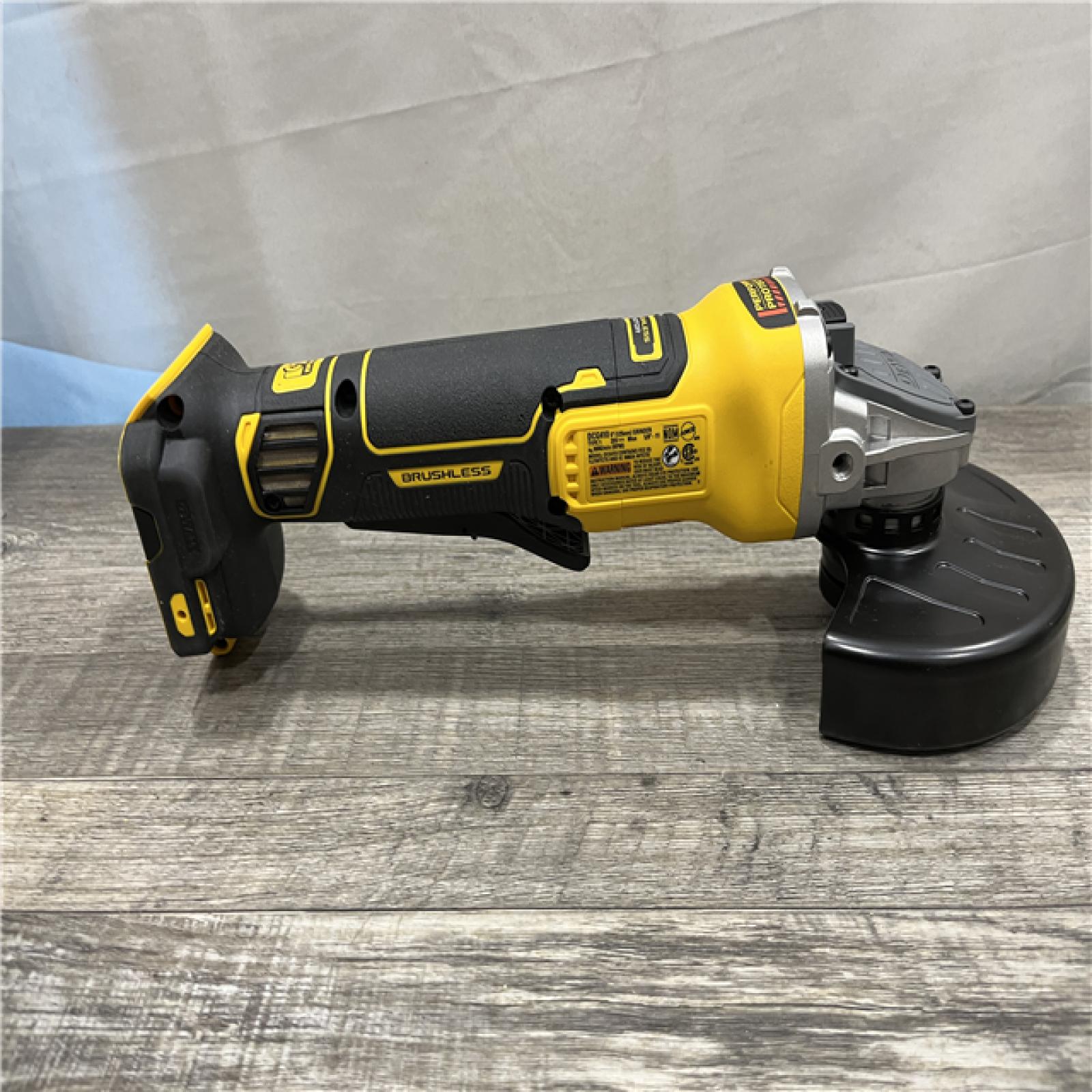 AS-IS DEWALT 20V MAX Lithium-Ion Cordless 4-1/2 in. - 5 in. Angle Grinder Kit
