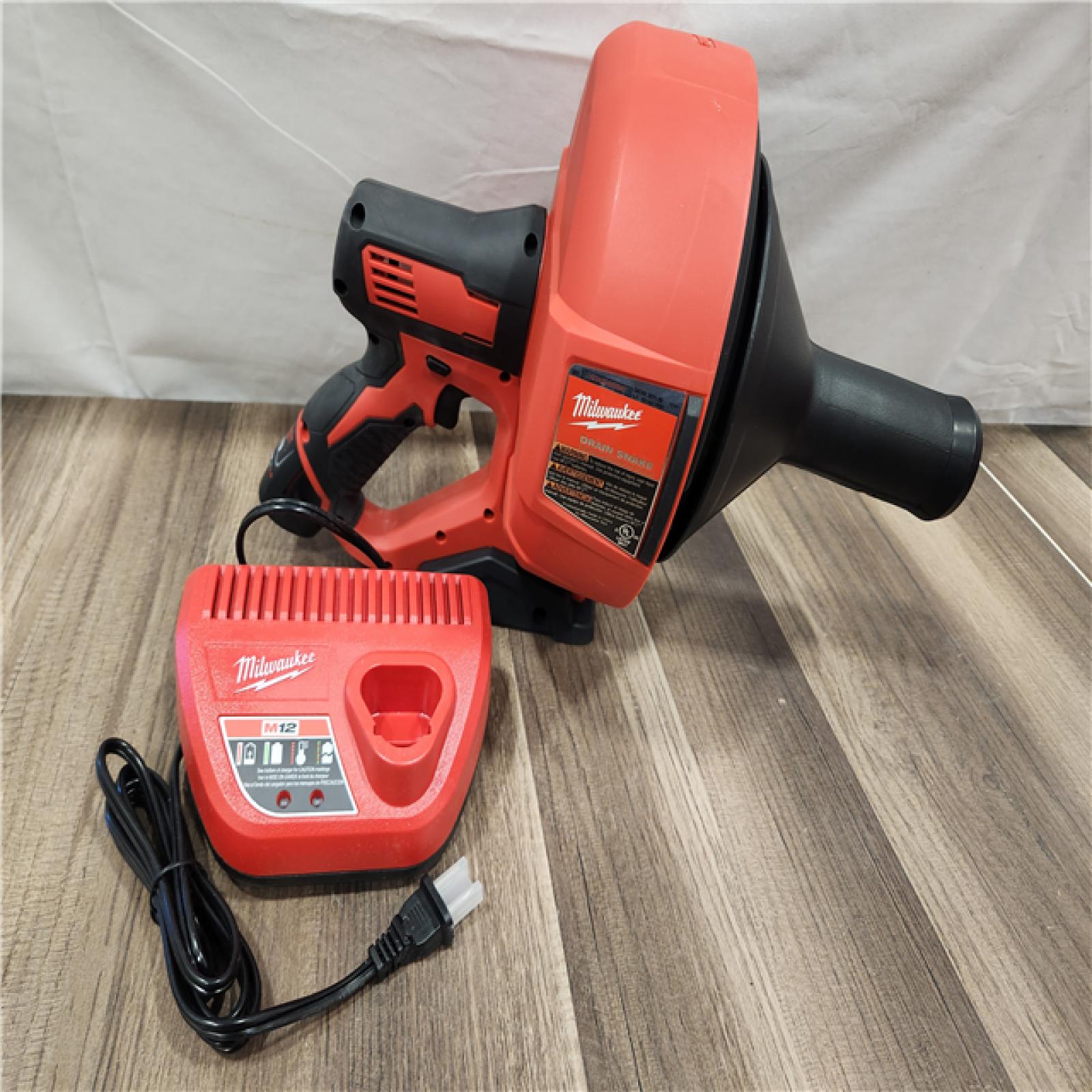 AS-IS- M12 Trap Snake 12V Lithium-Ion Cordless Toilet and Urinal Auger Power Driver W/ 1.5AH Battery and Charger